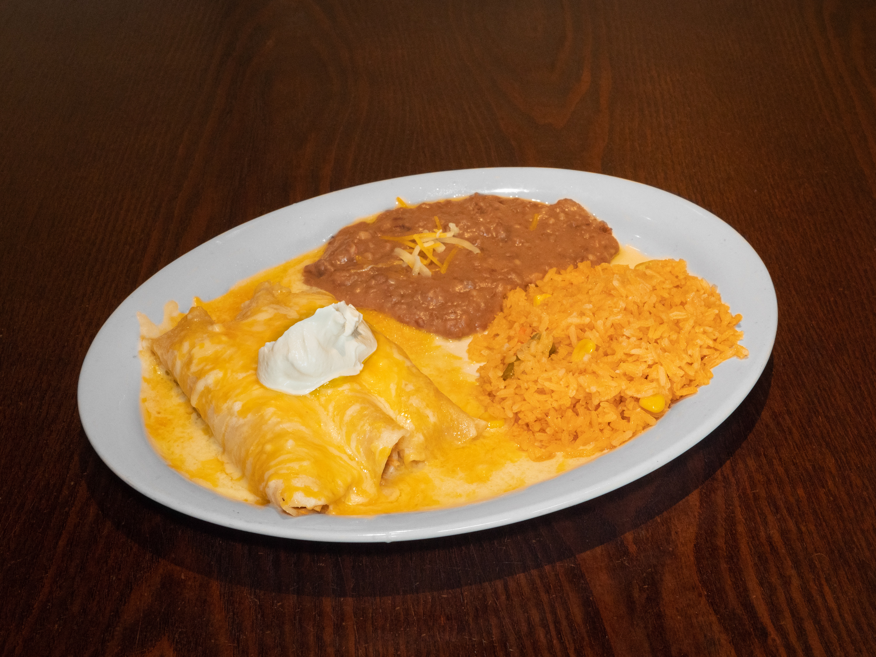 Order Chicken Enchiladas Dinner food online from Sports City Cantina store, Dallas on bringmethat.com