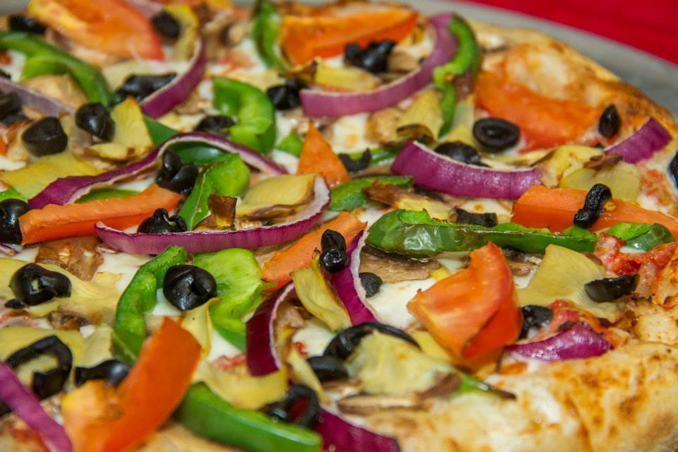Order Veggie Deluxe Pizza  food online from Pasta Basta store, Daly City on bringmethat.com