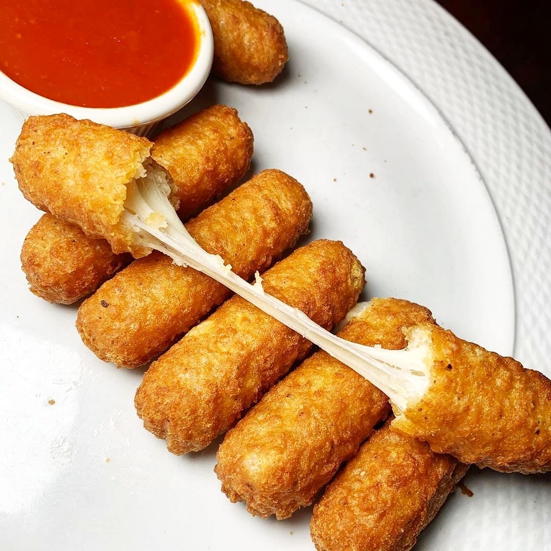 Order Mozzarella Sticks  food online from Raimos Pizza Of Amityville store, Amityville on bringmethat.com