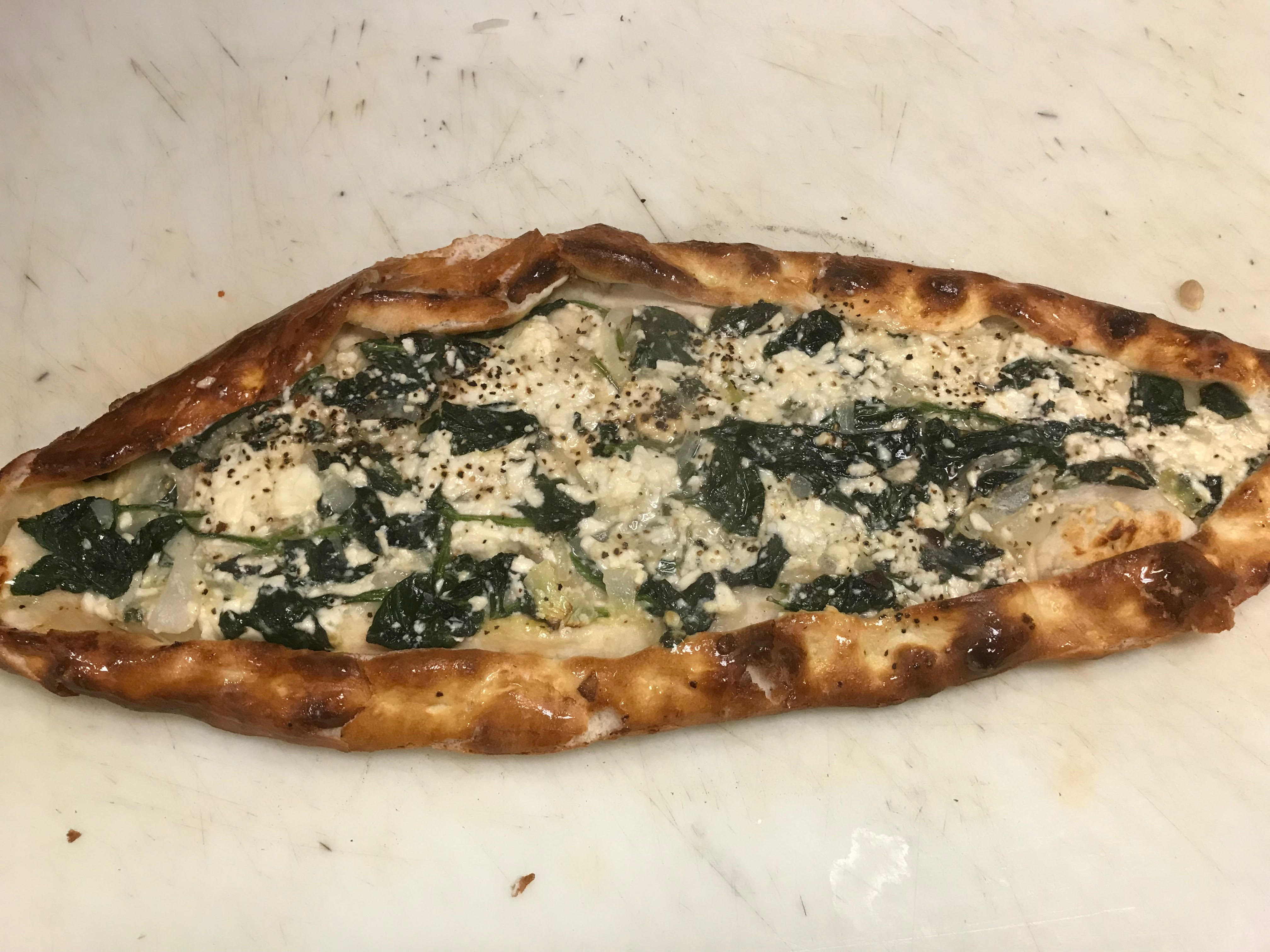 Order ISPANAKLI PIDE (SPINACH AND FETA PIDE ) food online from Kebab House store, Newport News on bringmethat.com