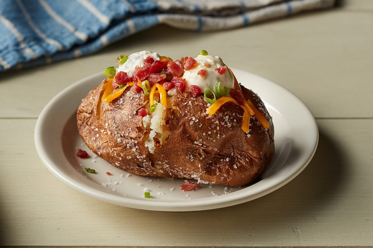 Order Loaded Baked Potato food online from Cracker Barrel store, Goodyear on bringmethat.com