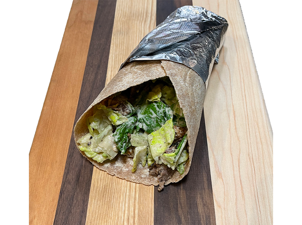 Order Steak Tip Caesar Wrap food online from Land of Pizza Inc store, South Boston on bringmethat.com