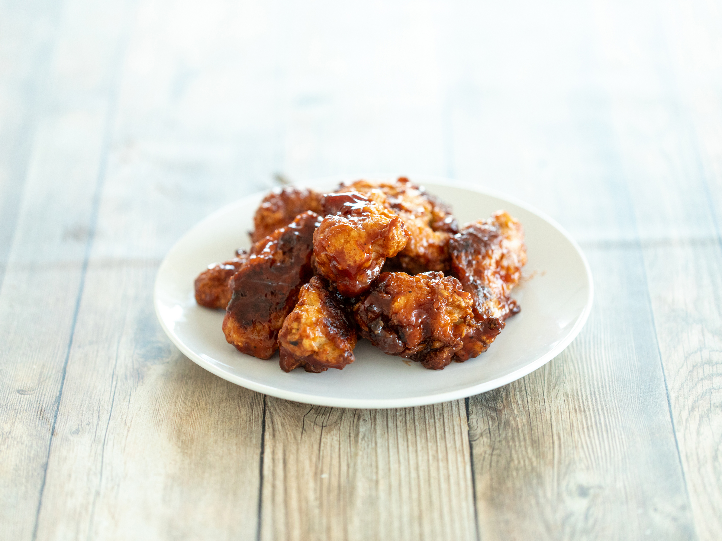 Order 12 Piece Wings food online from All American Sandwiches N Pizza store, San Diego on bringmethat.com