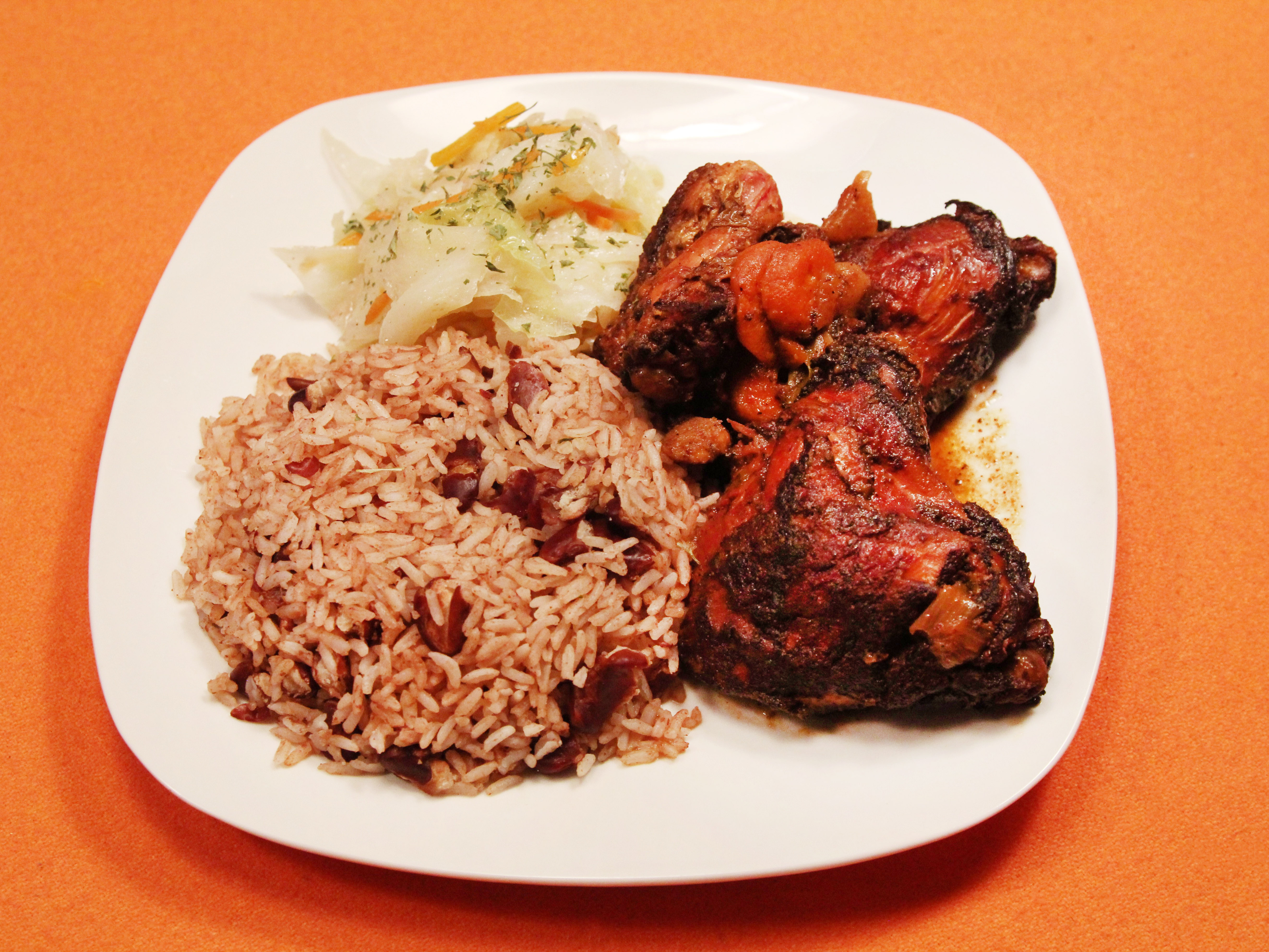 Order Brown Stew Chicken food online from Caribbean Vybz Bar & Grille store, Cleveland on bringmethat.com