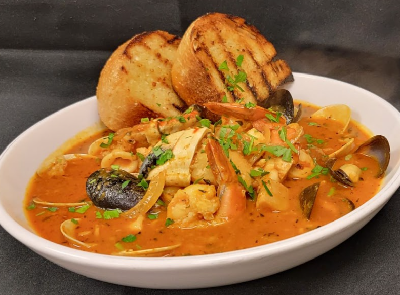 Order Wharf Cioppino food online from TAPS Fish House & Brewery store, Corona on bringmethat.com