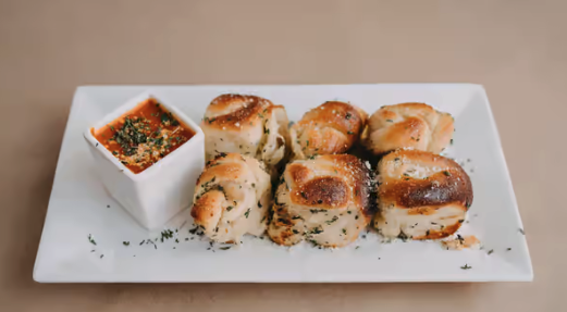 Order Garlic Knots food online from @Pizza store, Charlottesville on bringmethat.com
