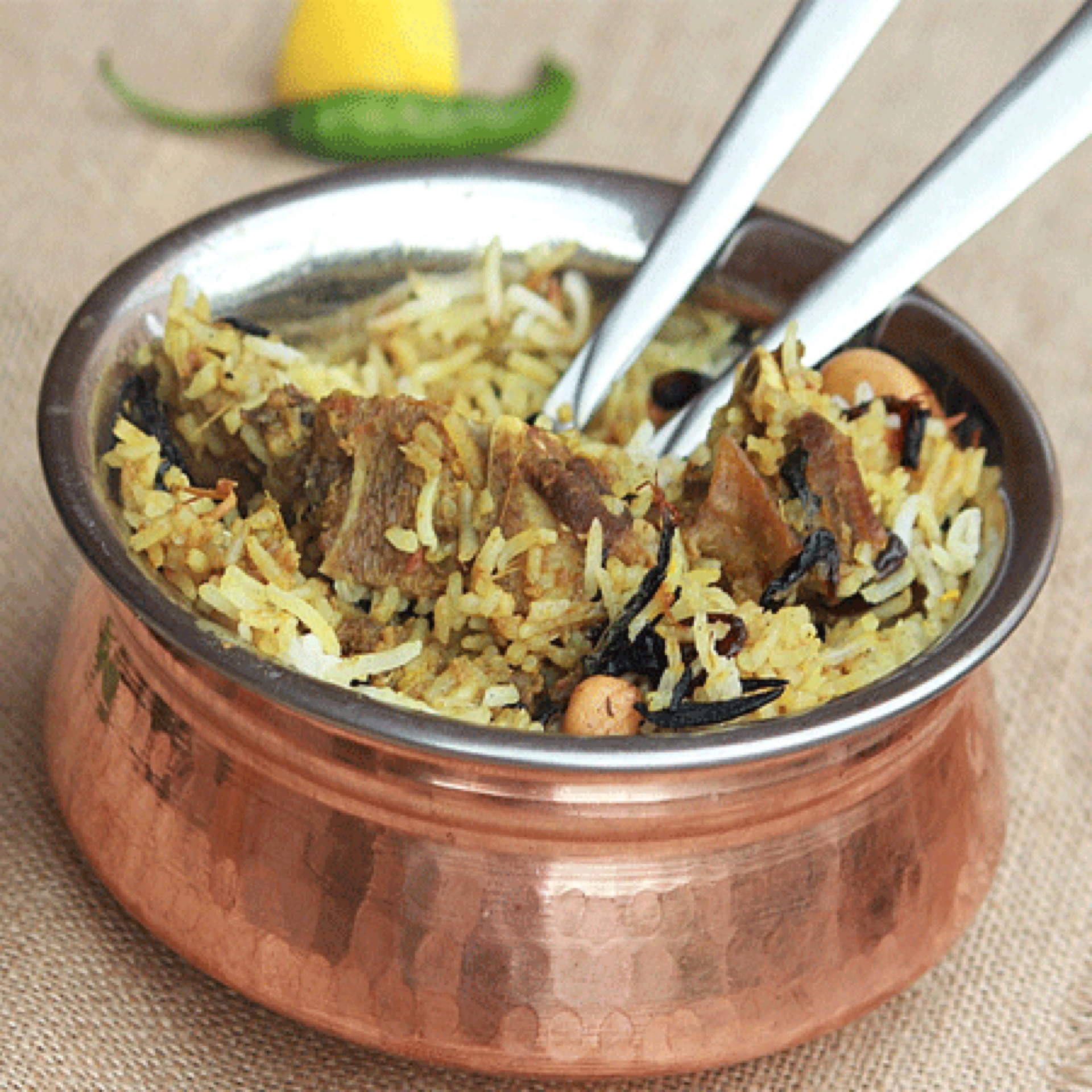 Order Goat Biryani food online from MasalaCraft Indian Cuisine store, Santa Ana on bringmethat.com