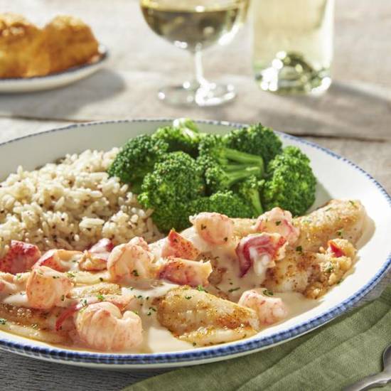 Order New! Lobster-Topped Stuffed Flounder food online from Red Lobster store, Lake Jackson on bringmethat.com