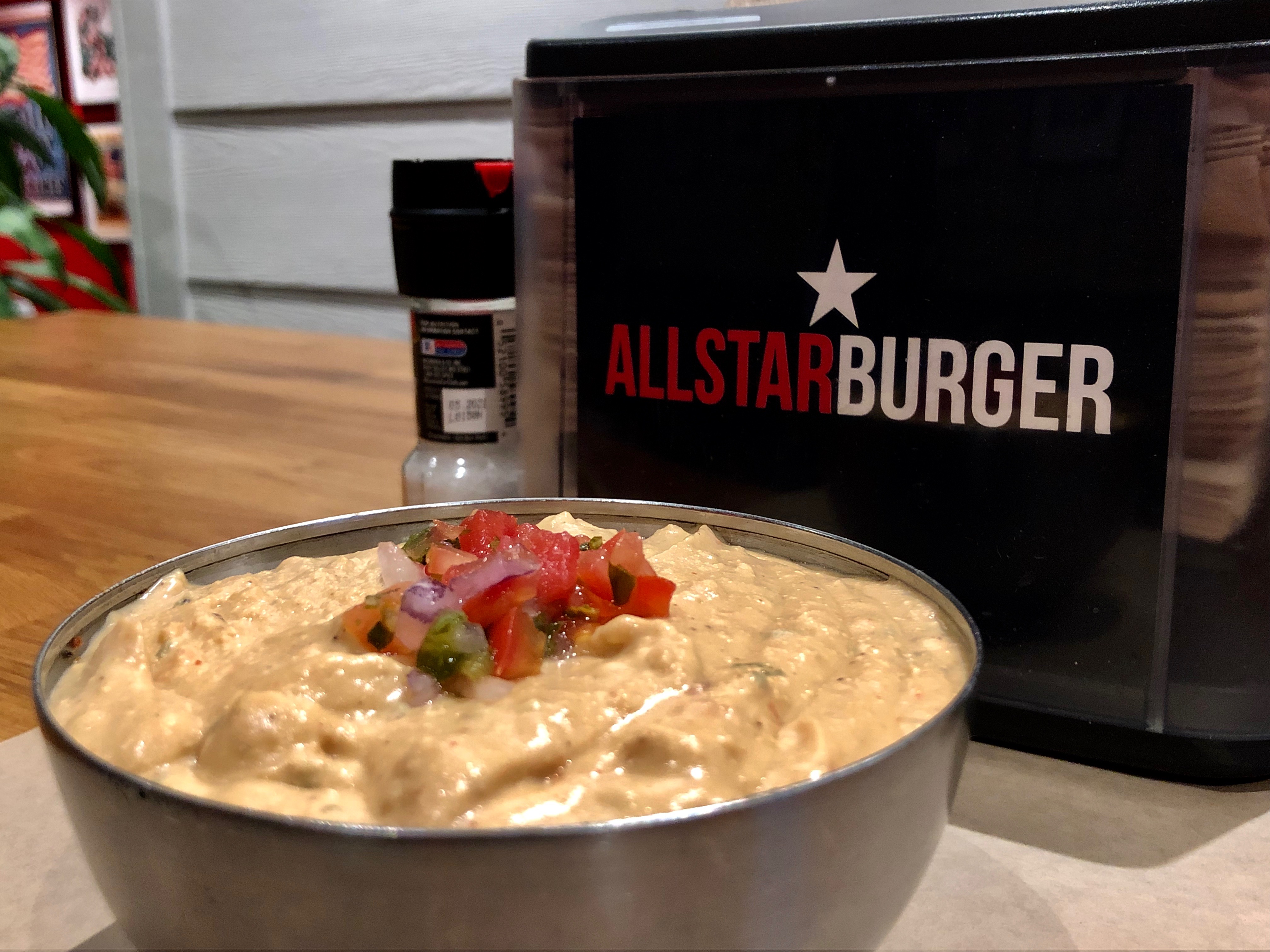 Order Homeamde Chips and Queso food online from All Star Burger store, Bee Cave on bringmethat.com