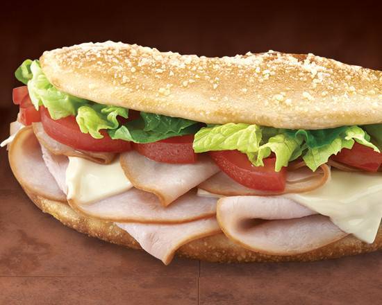Order Large Turkey Club Sub food online from Hungry Howie's store, Summerfield on bringmethat.com