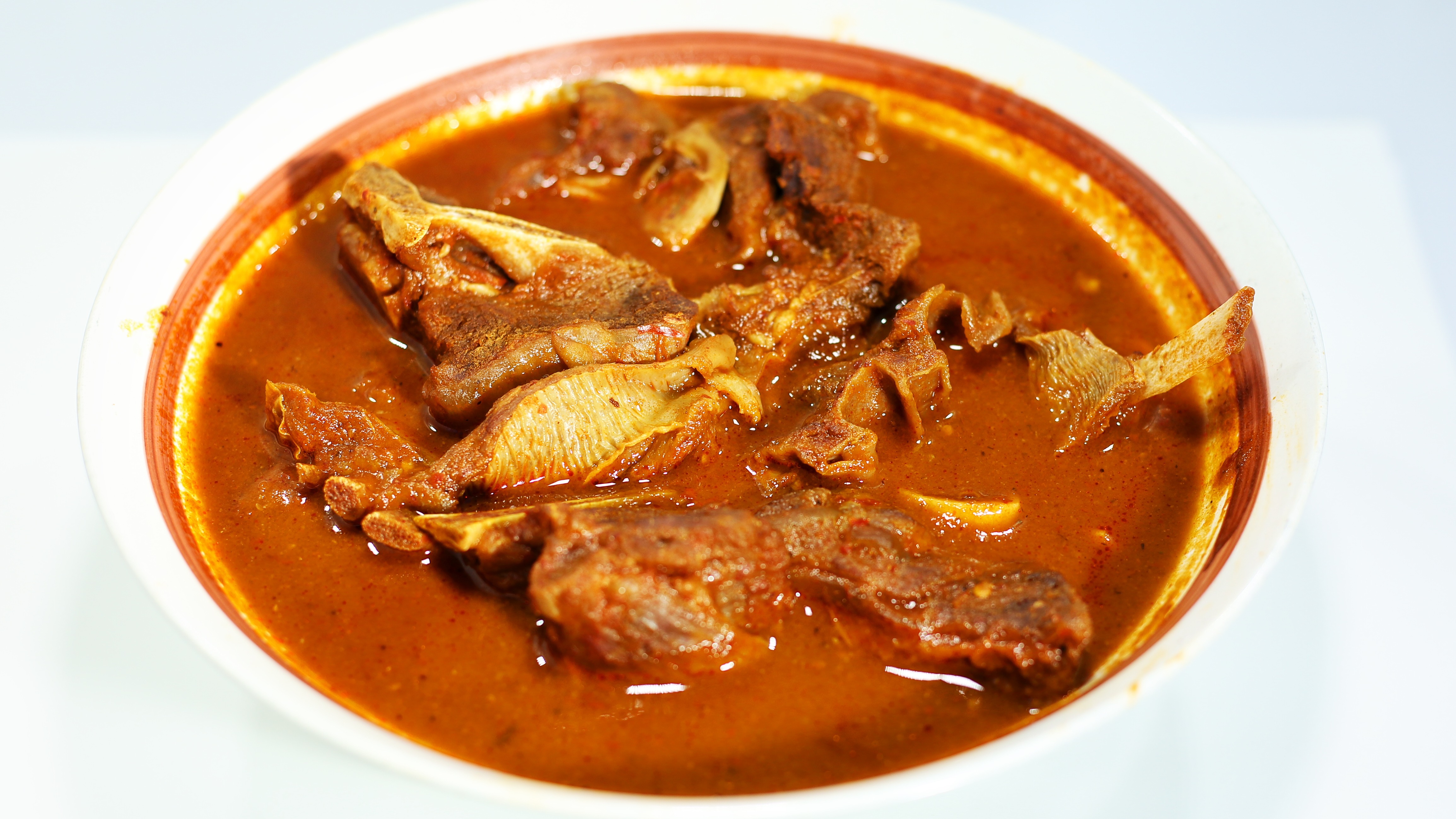 Order Birra Chivo / Goat Stew food online from Las Espuelas store, Dinuba on bringmethat.com