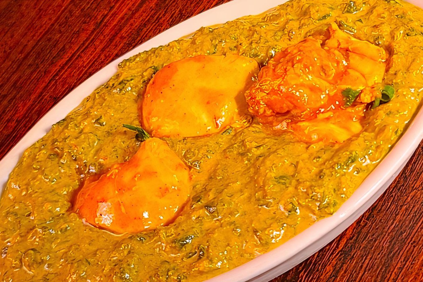 Order Chicken Saag food online from Mission Curry House store, San Francisco on bringmethat.com