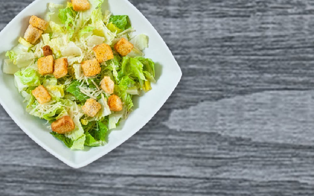 Order Side Caesar Salad - Regular food online from Seasons Pizza store, Wayne on bringmethat.com
