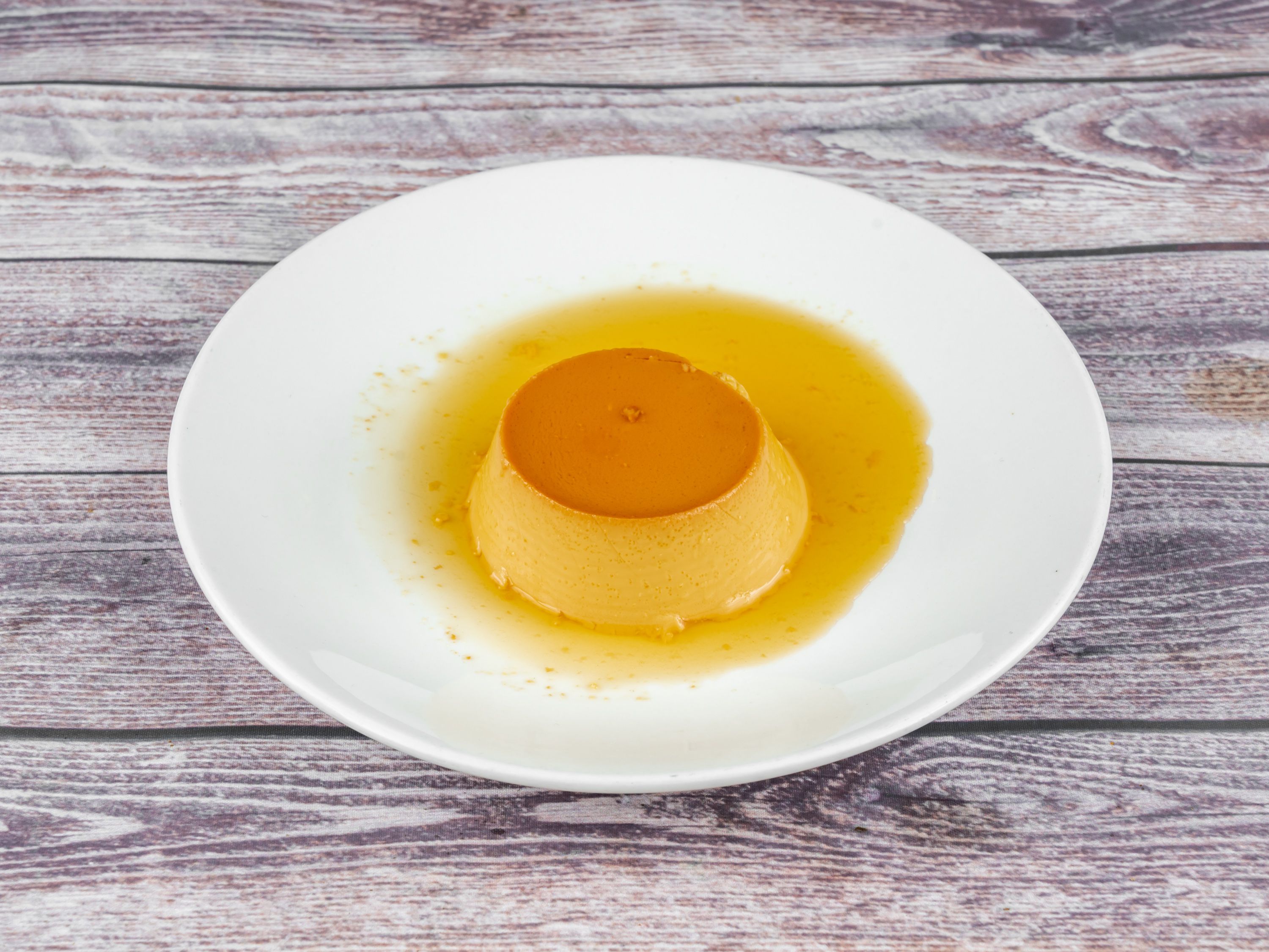 Order Flan food online from Tequila Lopez Mexican Restaurant store, Houston on bringmethat.com