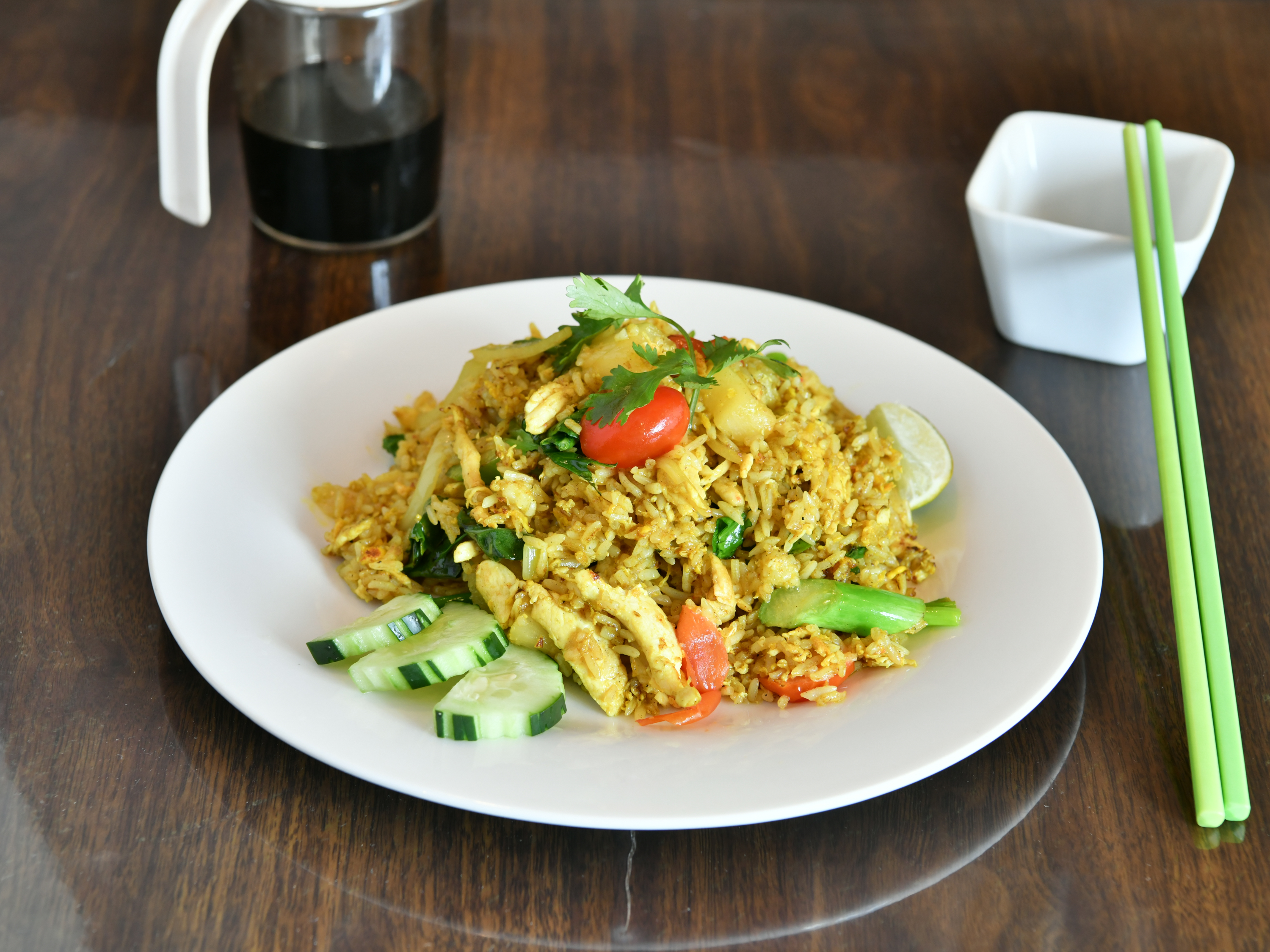 Order Curry Pineapple Fried Rice food online from Chok Dee Thai Kitchen store, Norwood on bringmethat.com