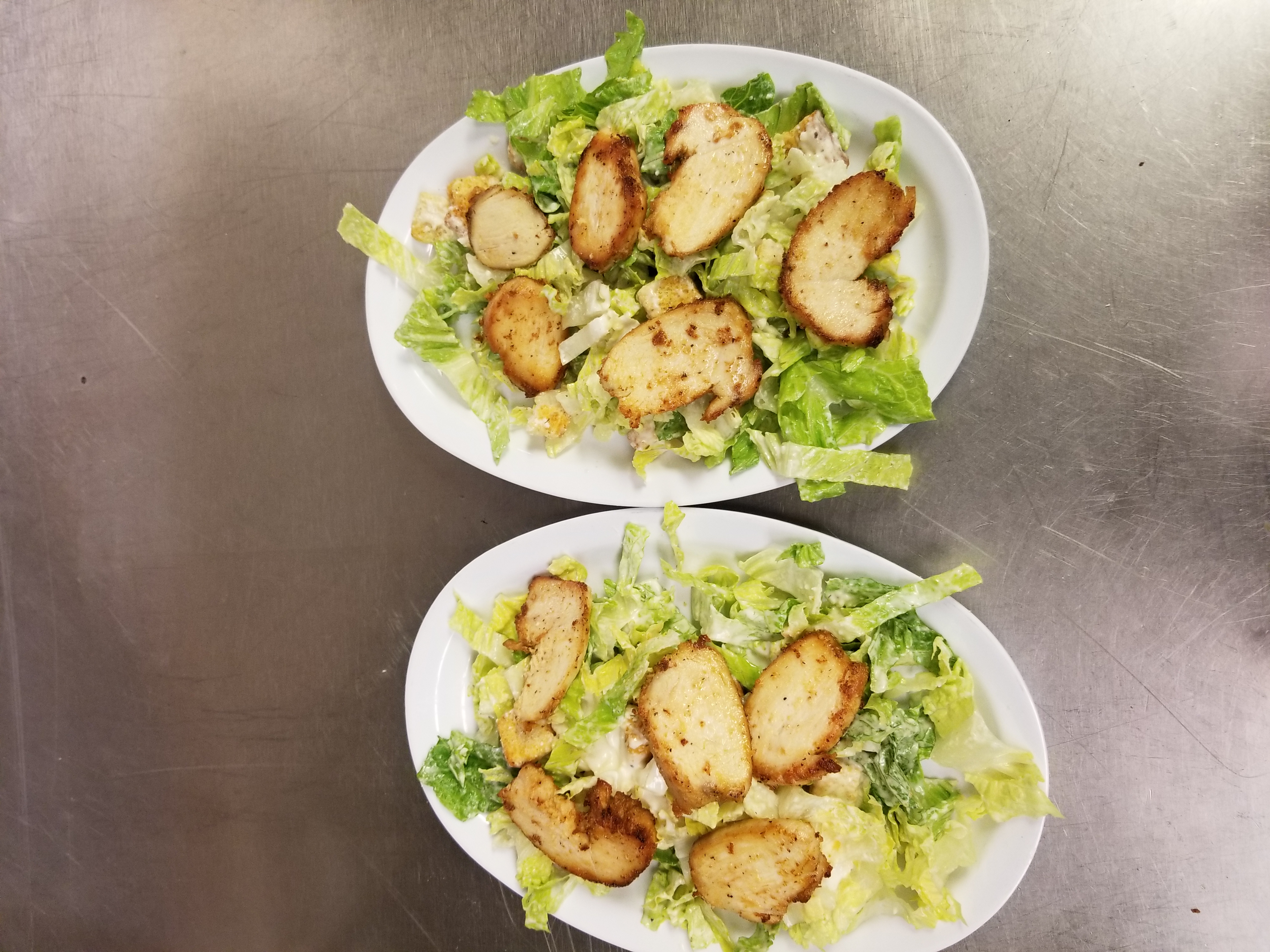 Order Grilled Chicken Caesar Salad food online from Brothers Pizza and Pasta store, Carrollton on bringmethat.com