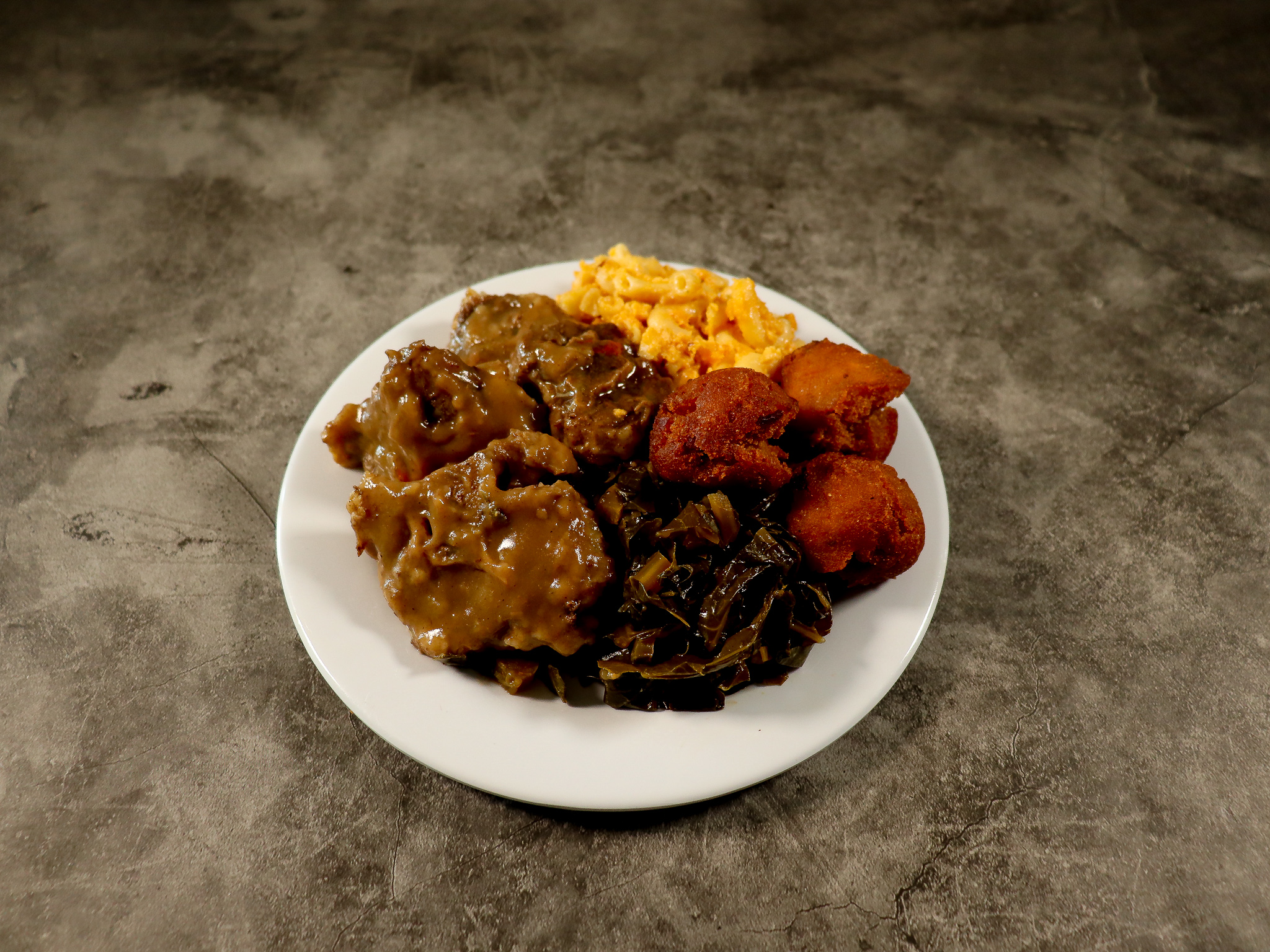 Order Oxtails food online from Savannah's Southern Belle Restaurant store, Linden on bringmethat.com