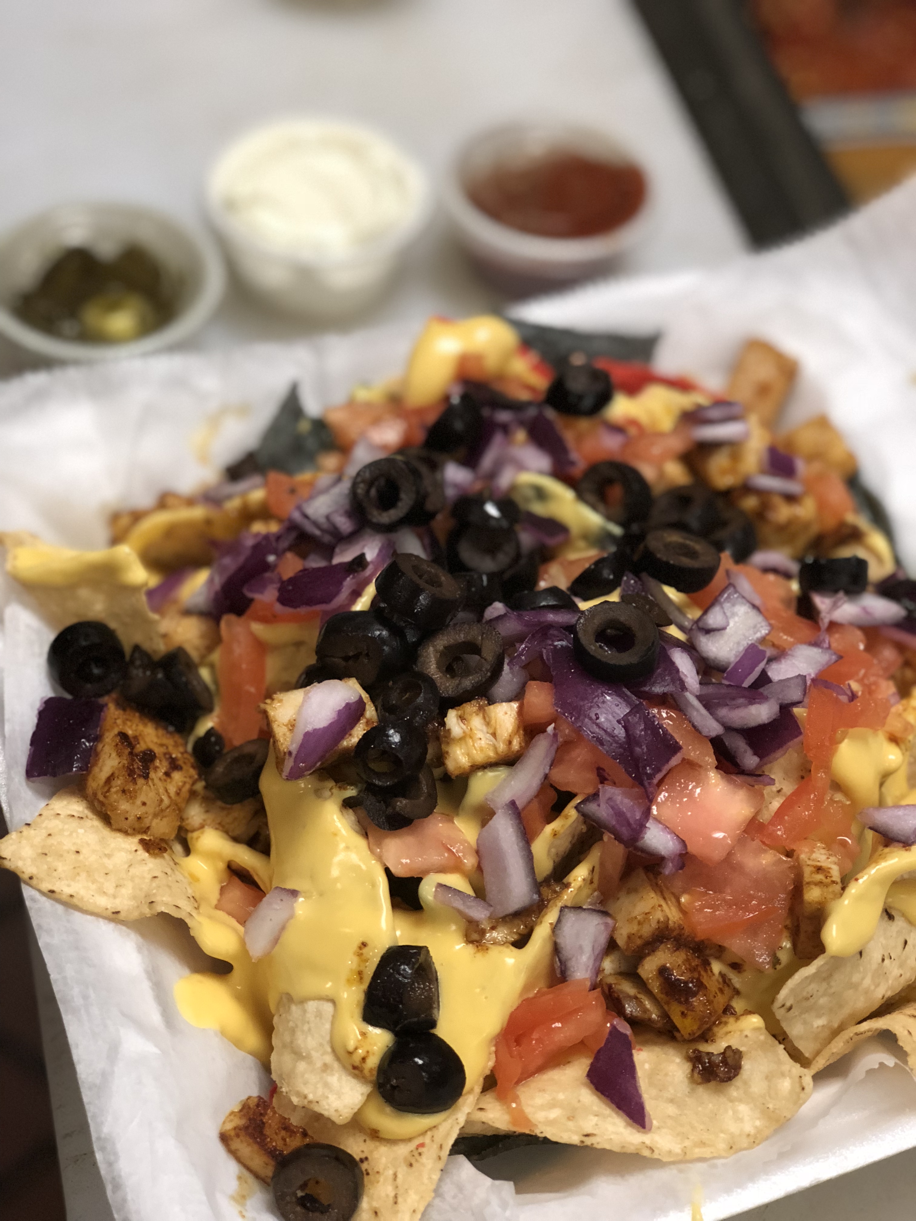 Order Nacho Supreme food online from Dominic's Bar & Grille store, Monrovia on bringmethat.com
