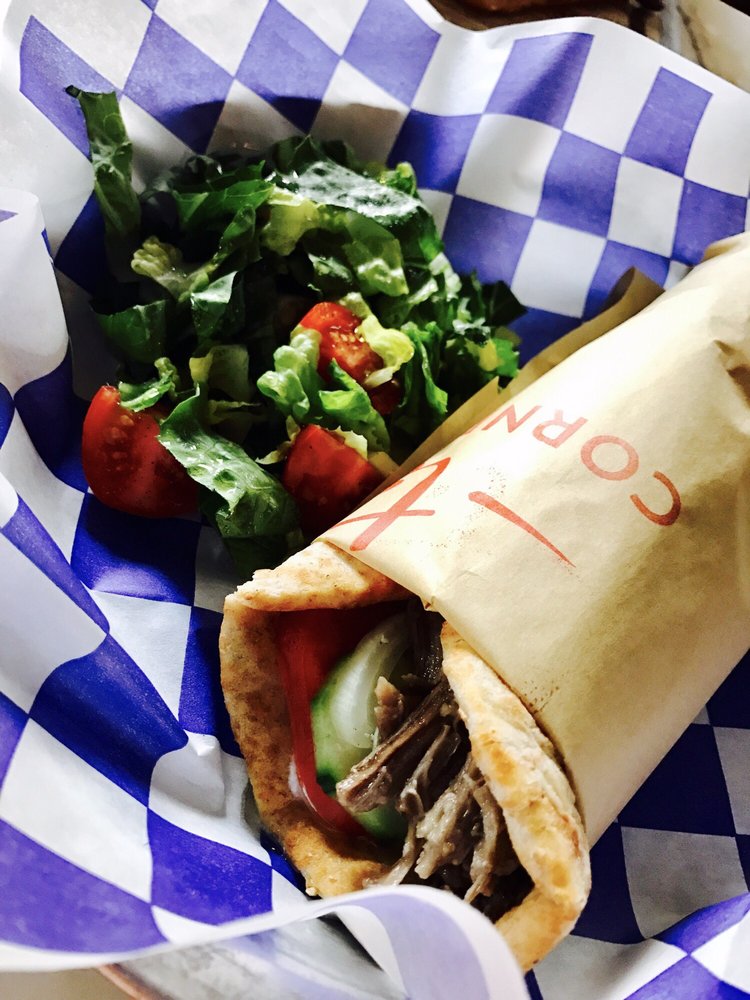 Order Roasted Rosemary Lamb Pita Sandwich food online from Ted's Corner Tavern store, New York on bringmethat.com