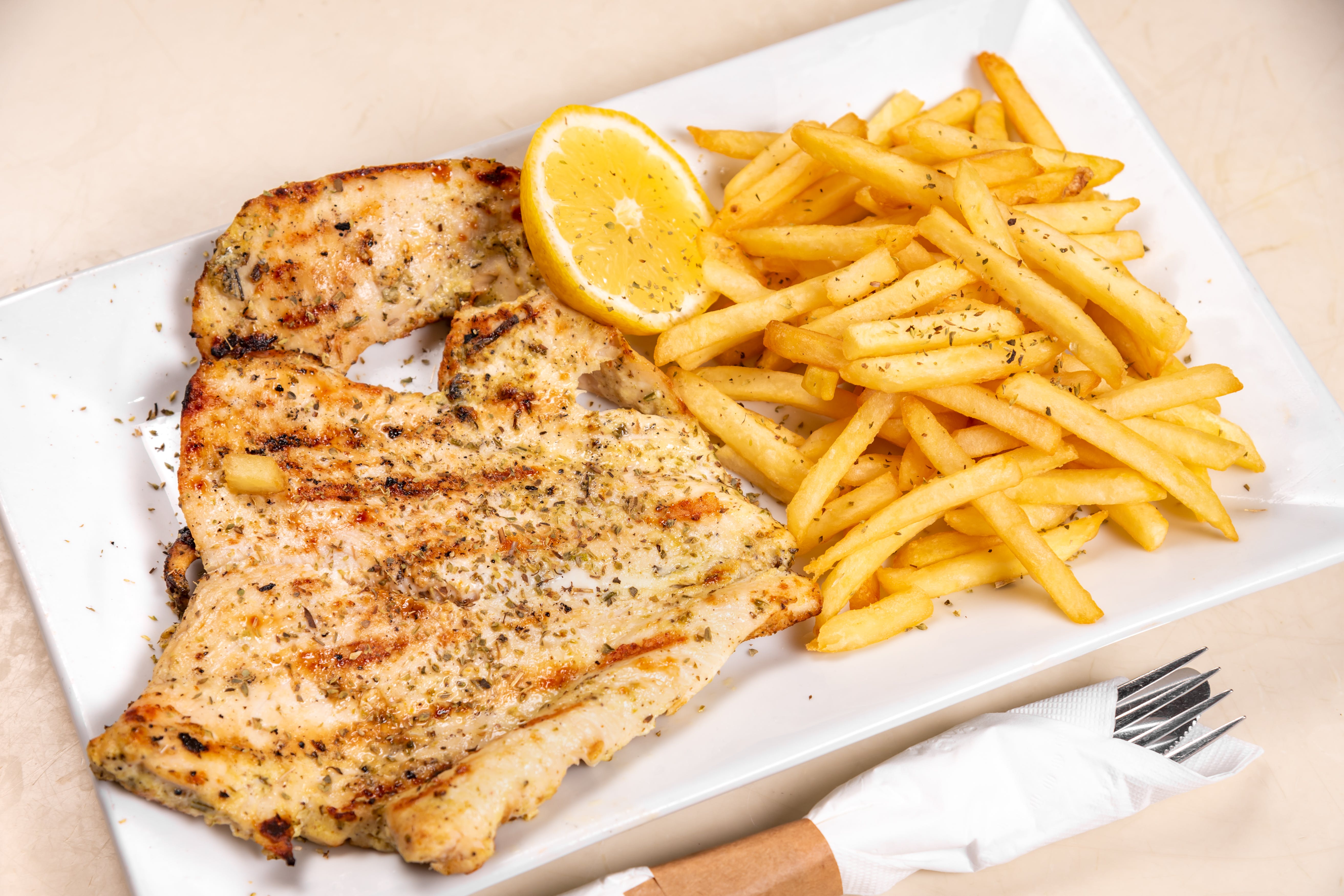 Order Grilled Herb Chicken Special - Special food online from Omonia Cafe store, Astoria on bringmethat.com