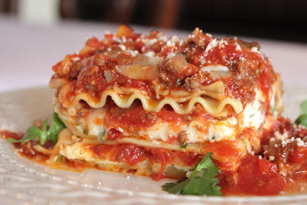 Order Baked Meat Lasagna - Pasta food online from Golden Pizzeria store, Norfolk on bringmethat.com