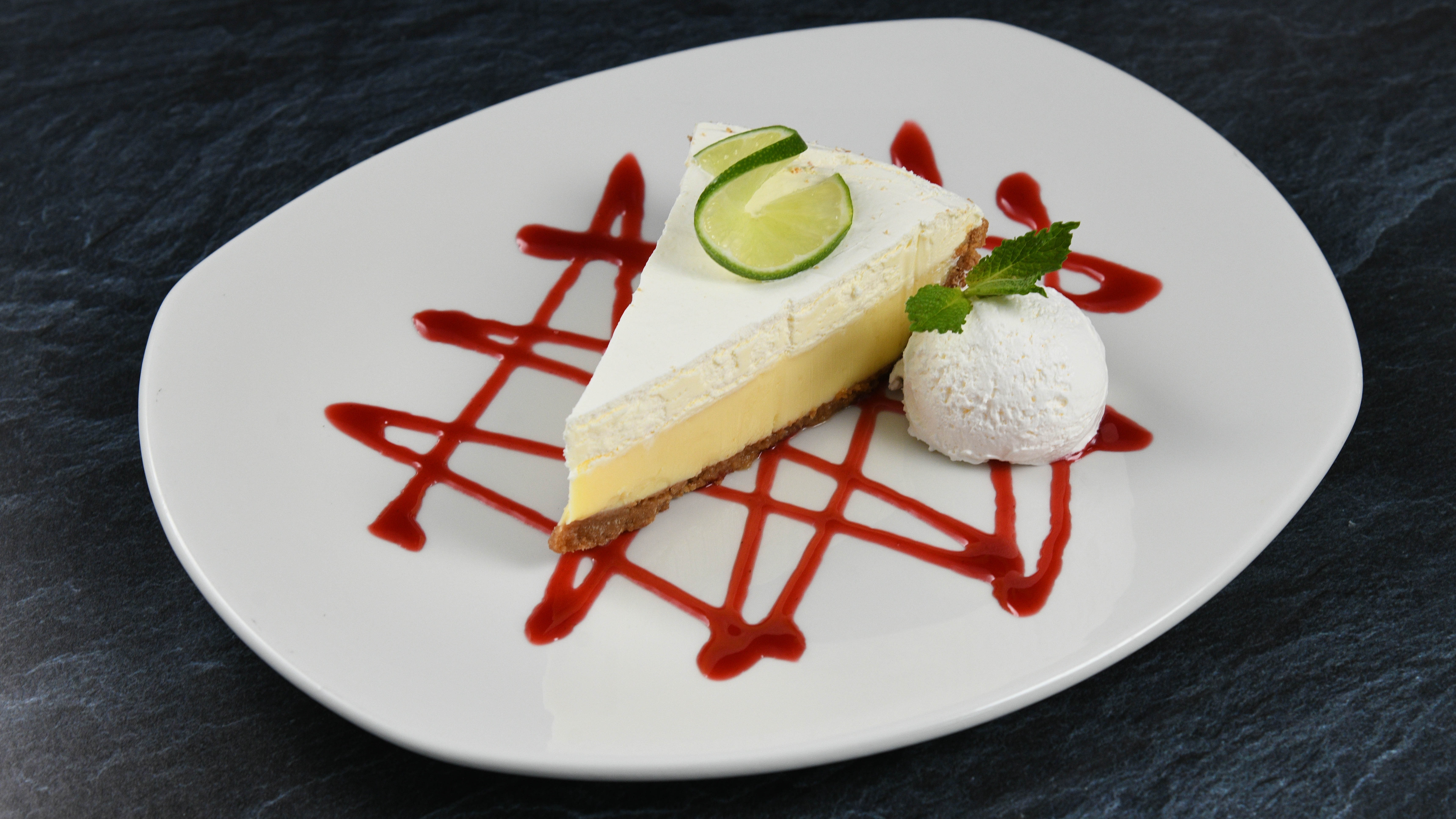 Order Key Lime Pie food online from Rainforest Cafe store, Atlantic City on bringmethat.com