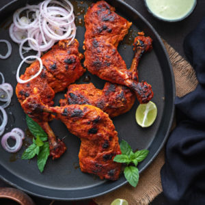 Order 98. Tandoori Chicken food online from Taj Restaurant store, Warren on bringmethat.com