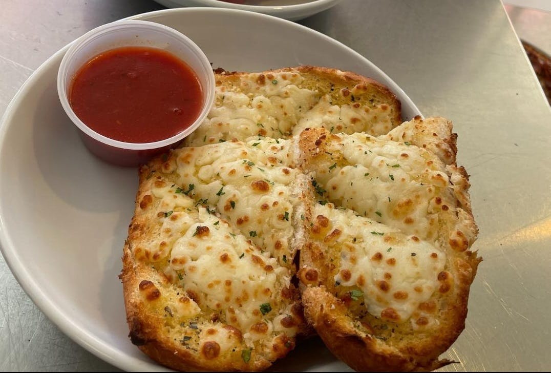 Order Garlic Bread with Cheese - Appetizer food online from Pepperoni's Pizza store, Rosenberg on bringmethat.com