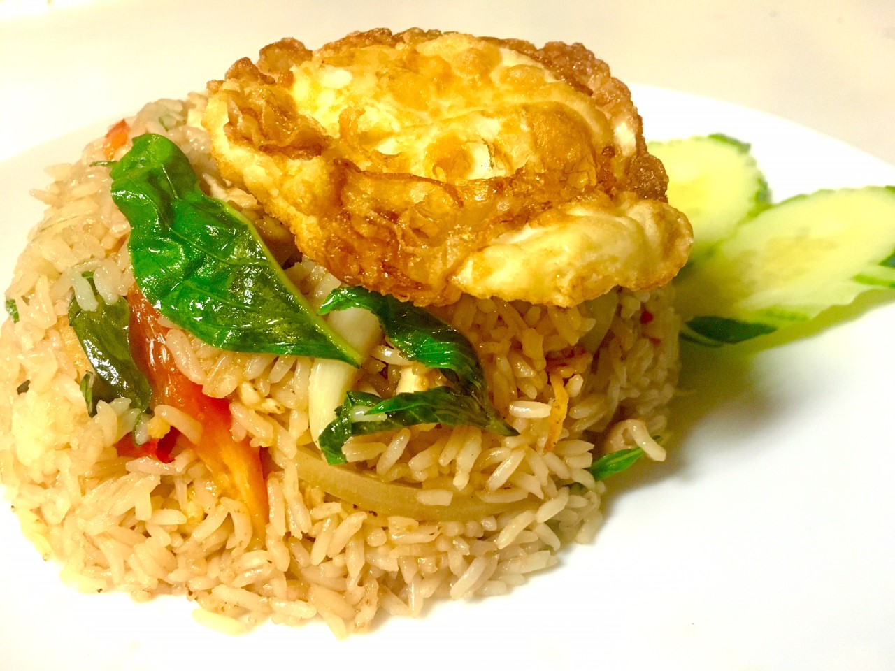 Order Basil Fried Rice food online from The Patio Fine Thai Cuisine store, Seattle on bringmethat.com
