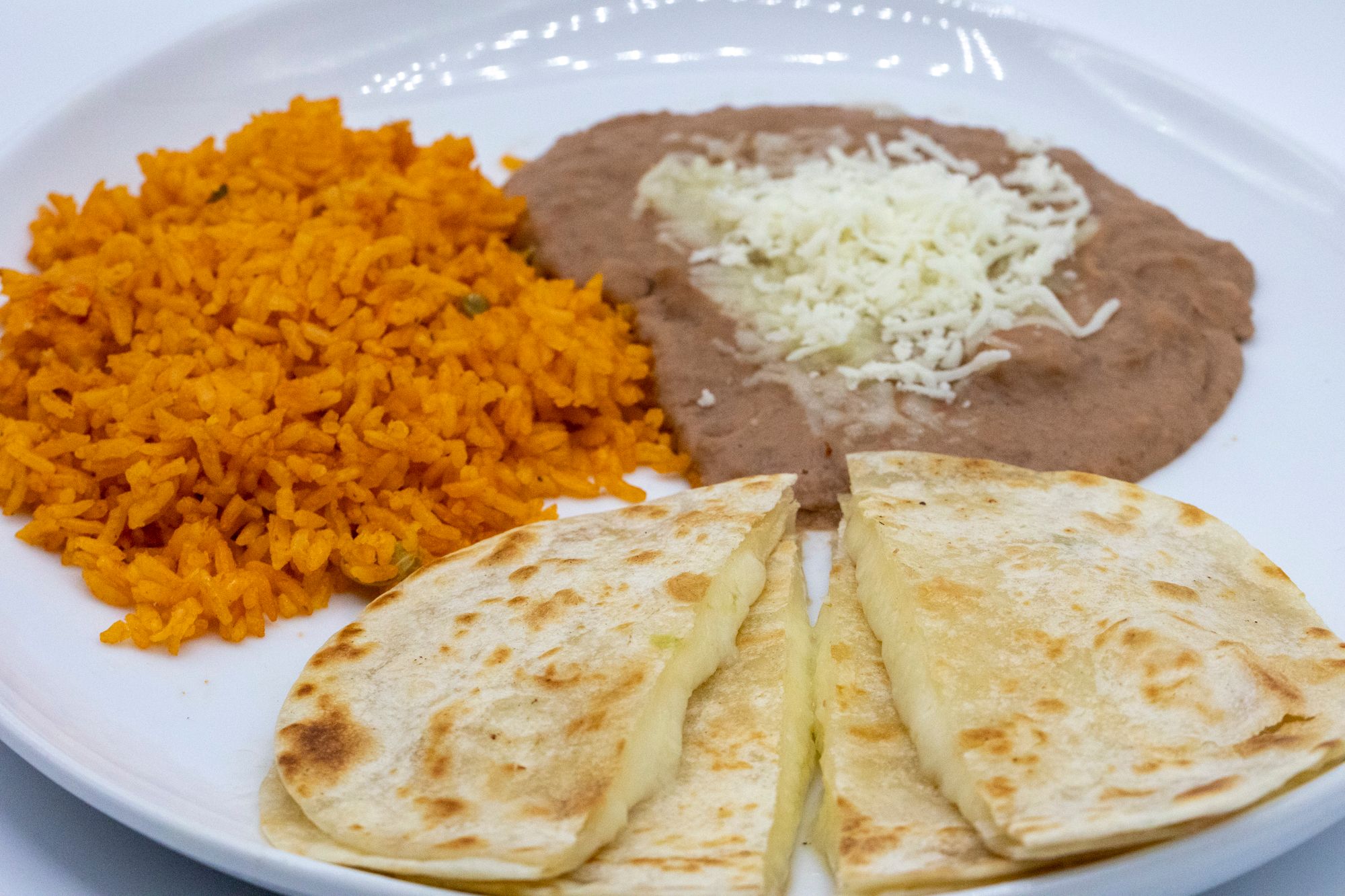 Order Quesadilla Dinner food online from Cilantro Taco Grill store, Rosemont on bringmethat.com
