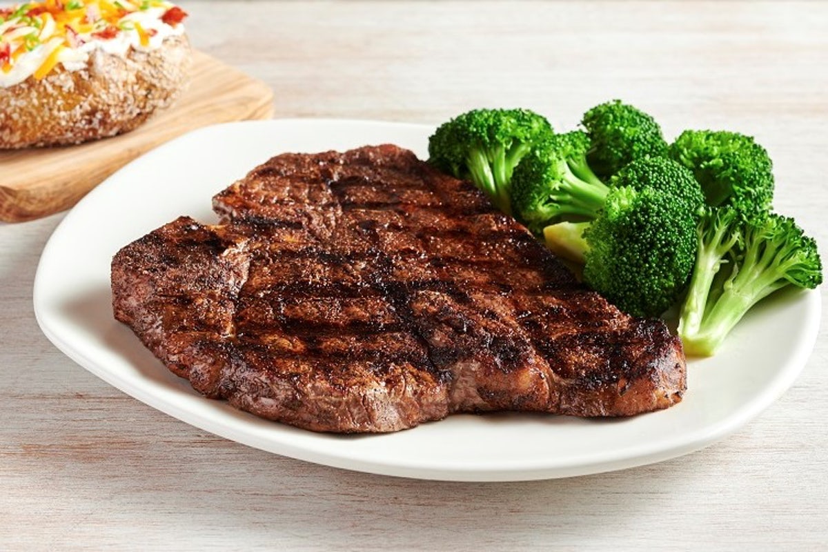 Order Melbourne Porterhouse* 22 oz. food online from Outback Steakhouse store, Macon on bringmethat.com