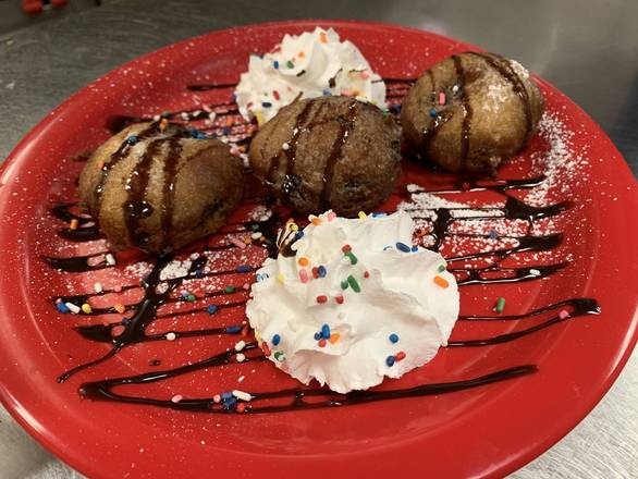 Order Deep Fried Oreo's food online from Mineos Pizza & Wings store, Franklin on bringmethat.com