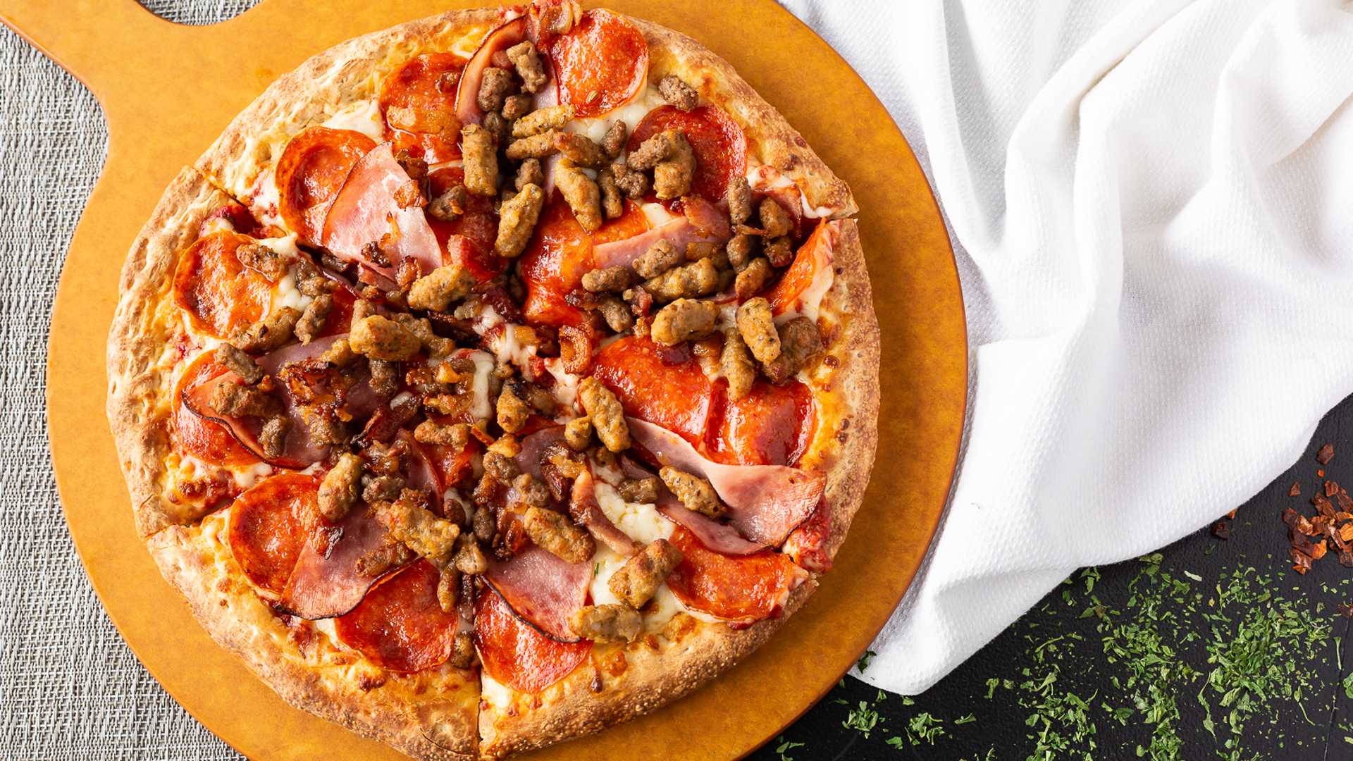 Order Meat Lovers Pizza food online from Mr Pizza store, Van Nuys on bringmethat.com