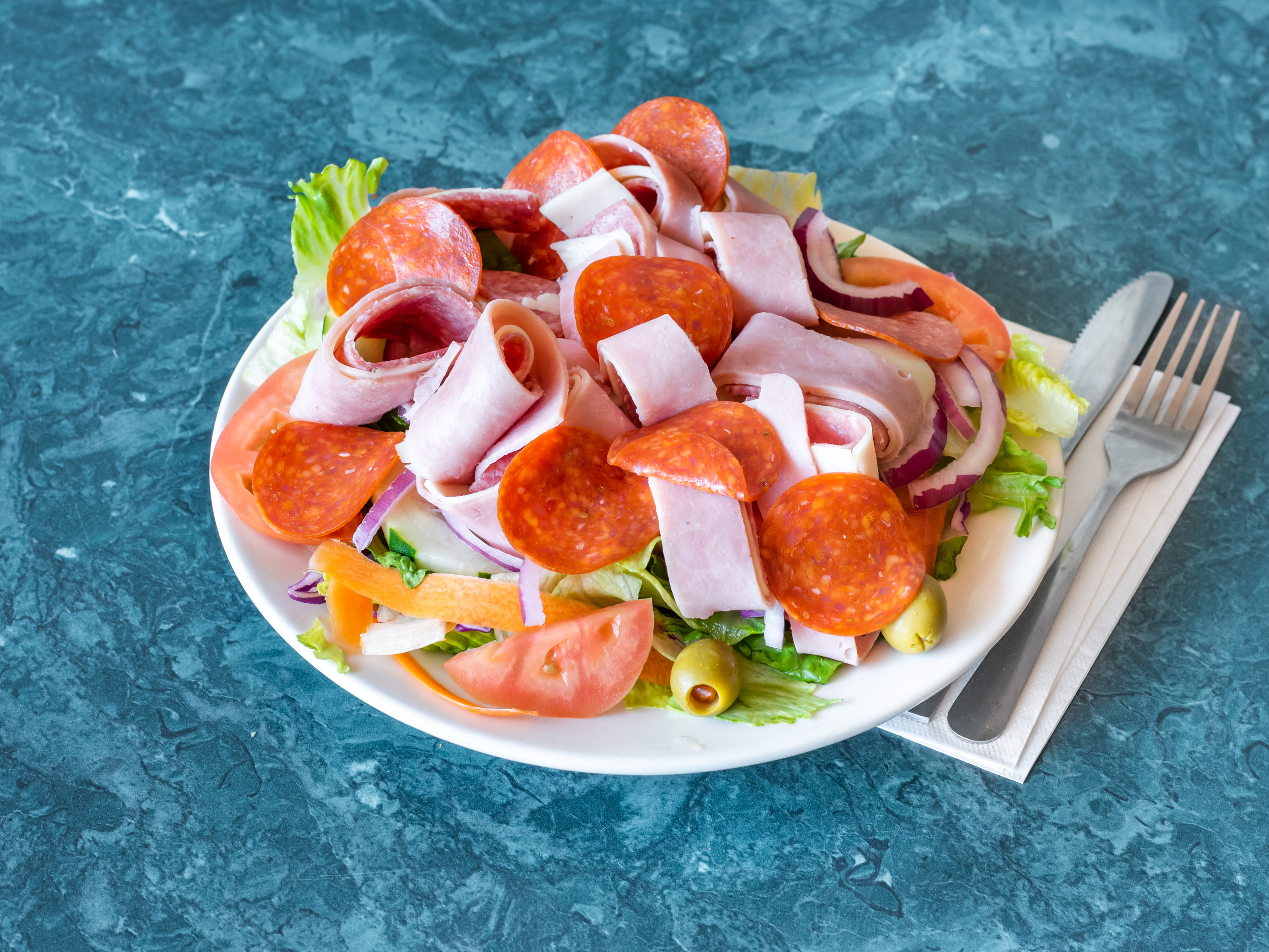 Order Antipasto Salad food online from Guidos Pizza store, Eatontown on bringmethat.com