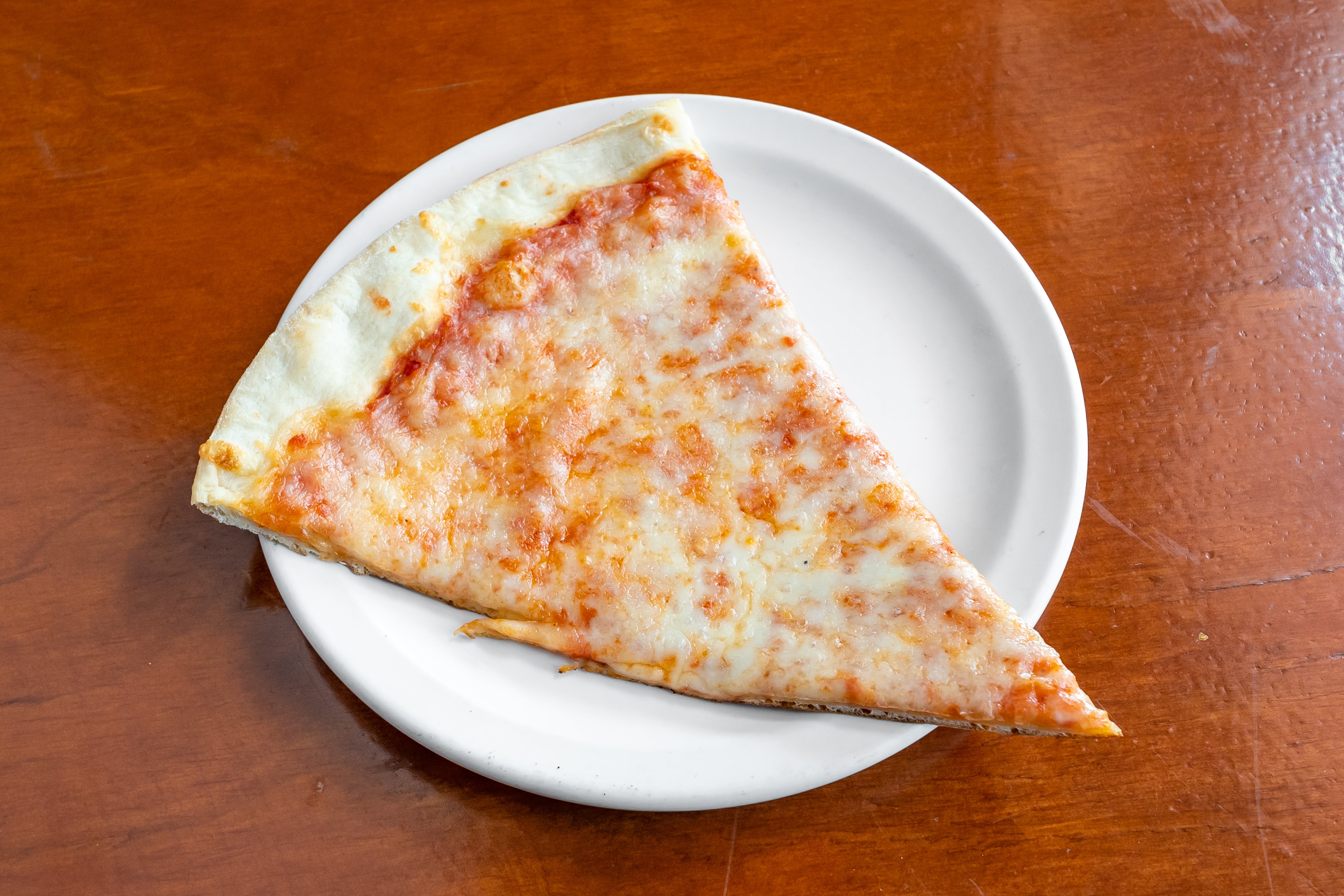 Order Traditional Plain Cheese Pizza - Small food online from Pizza Village Tomato Pie store, Lahaska on bringmethat.com