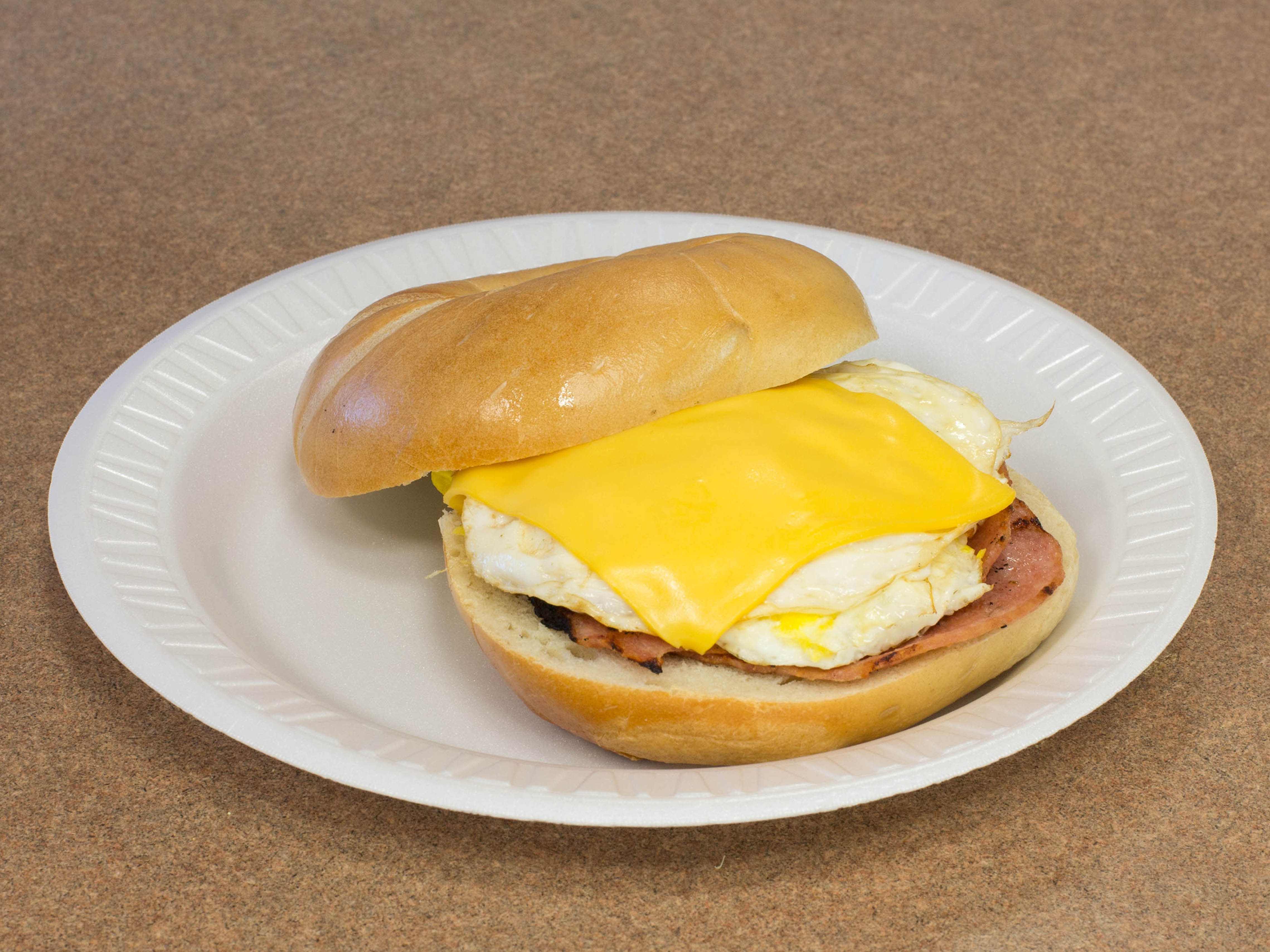 Order Eggs and Cheese Sandwich food online from Hot Bagels Abroad store, Clifton on bringmethat.com