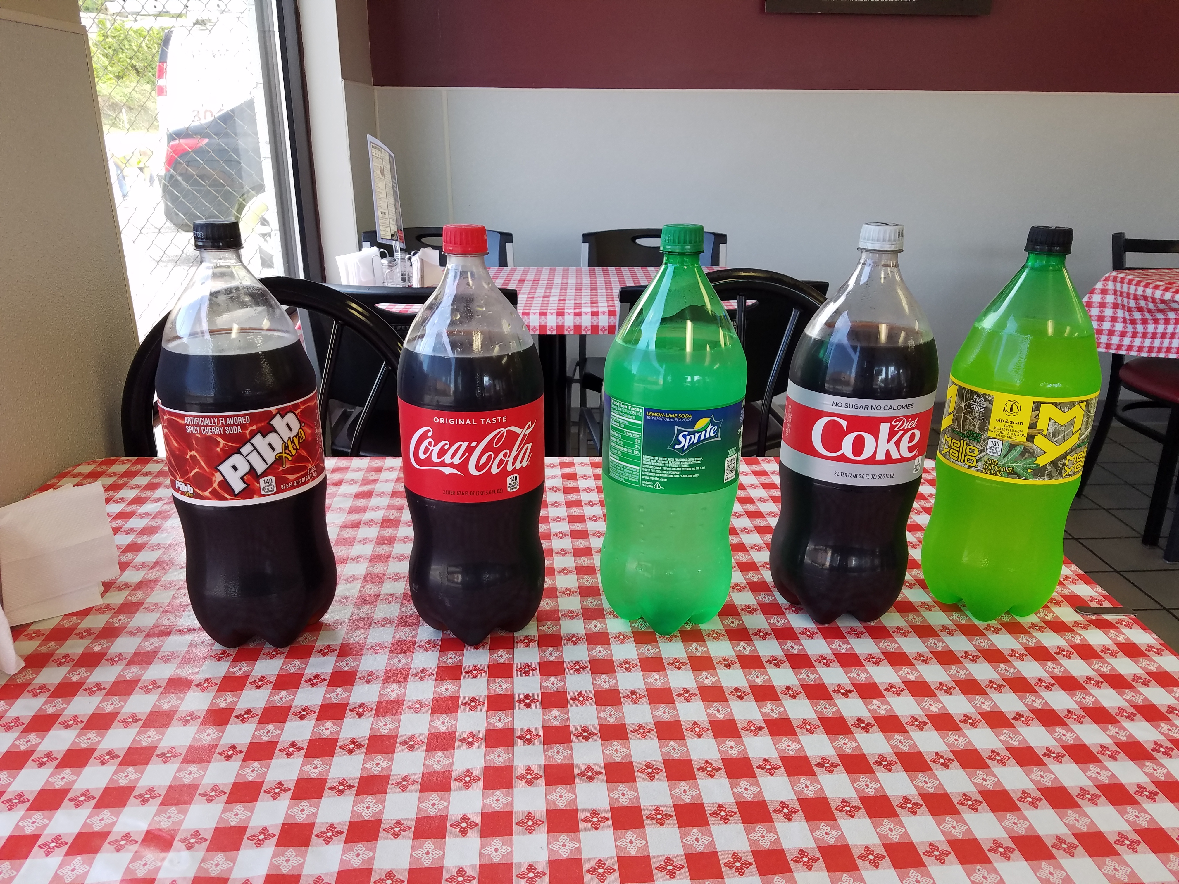 Order 2 Litter Coke food online from Giovanni's Pizza Place store, Charleston on bringmethat.com