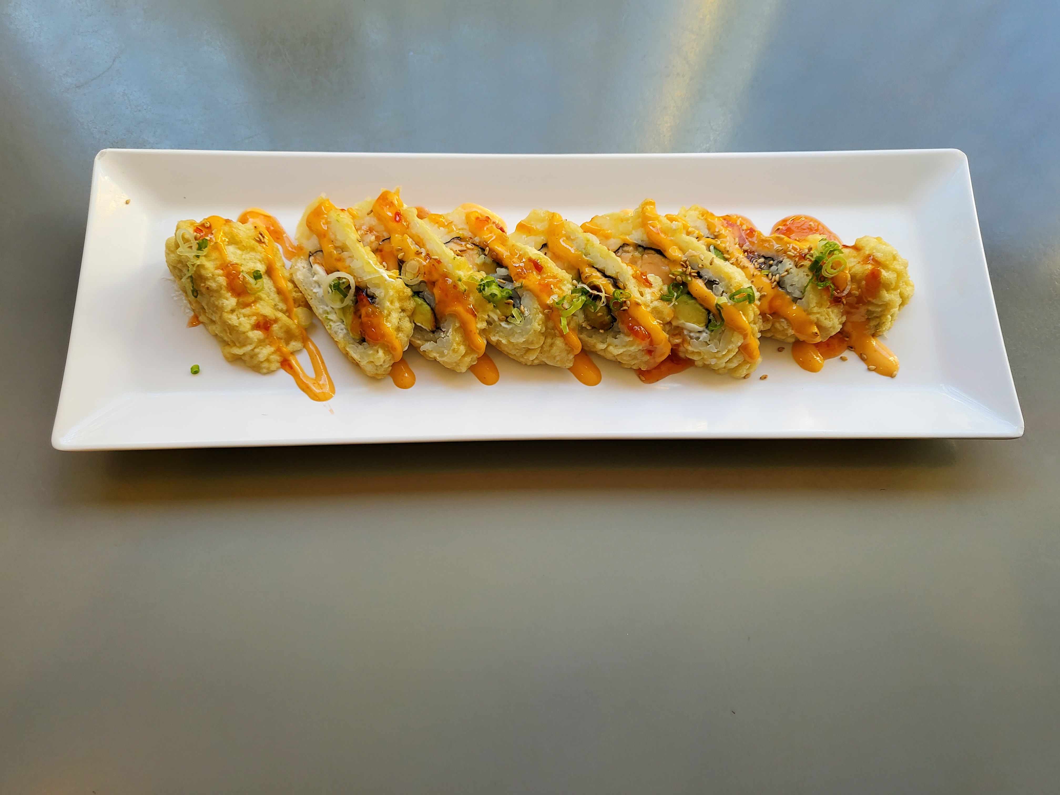 Order DeepFried  Philly Roll food online from Sushi Toni store, San Francisco on bringmethat.com