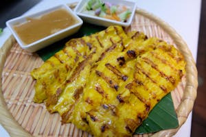 Order Chicken Satay food online from Tamarind Thai Cuisine store, Camarillo on bringmethat.com