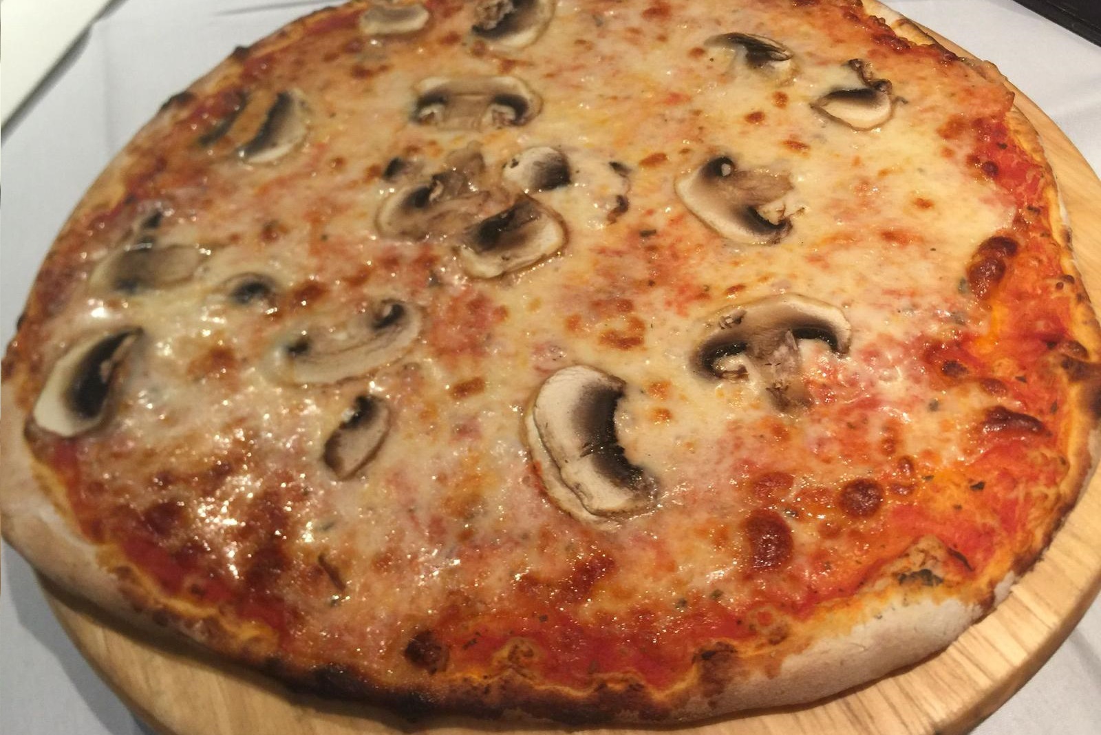 Order 20 Funghi Pizza food online from Andiamo Pizzaria store, Chicago on bringmethat.com