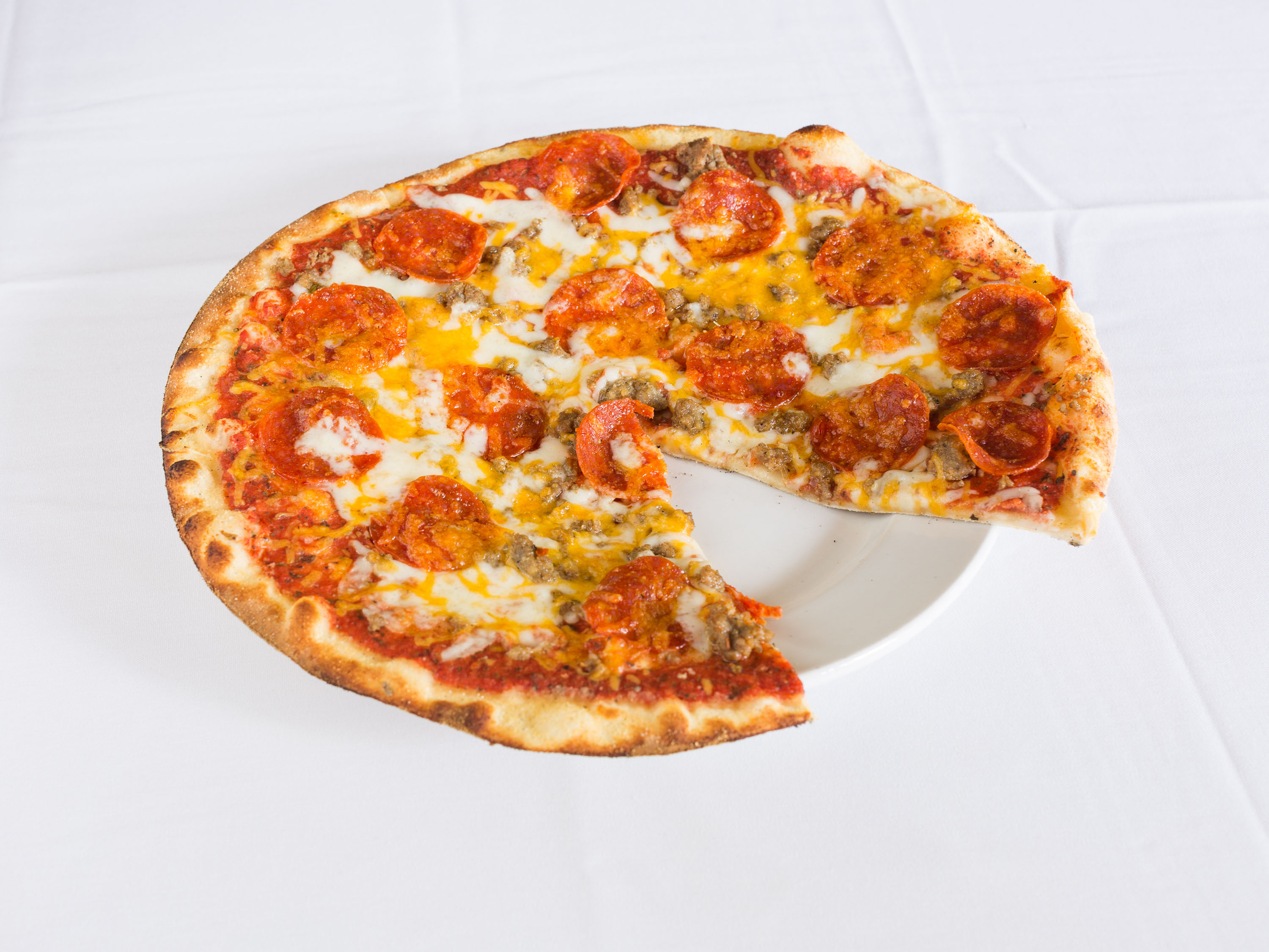 Order Sausage and Pepperoni Pizza food online from Trio A Brick Oven Cafe store, Greenville on bringmethat.com