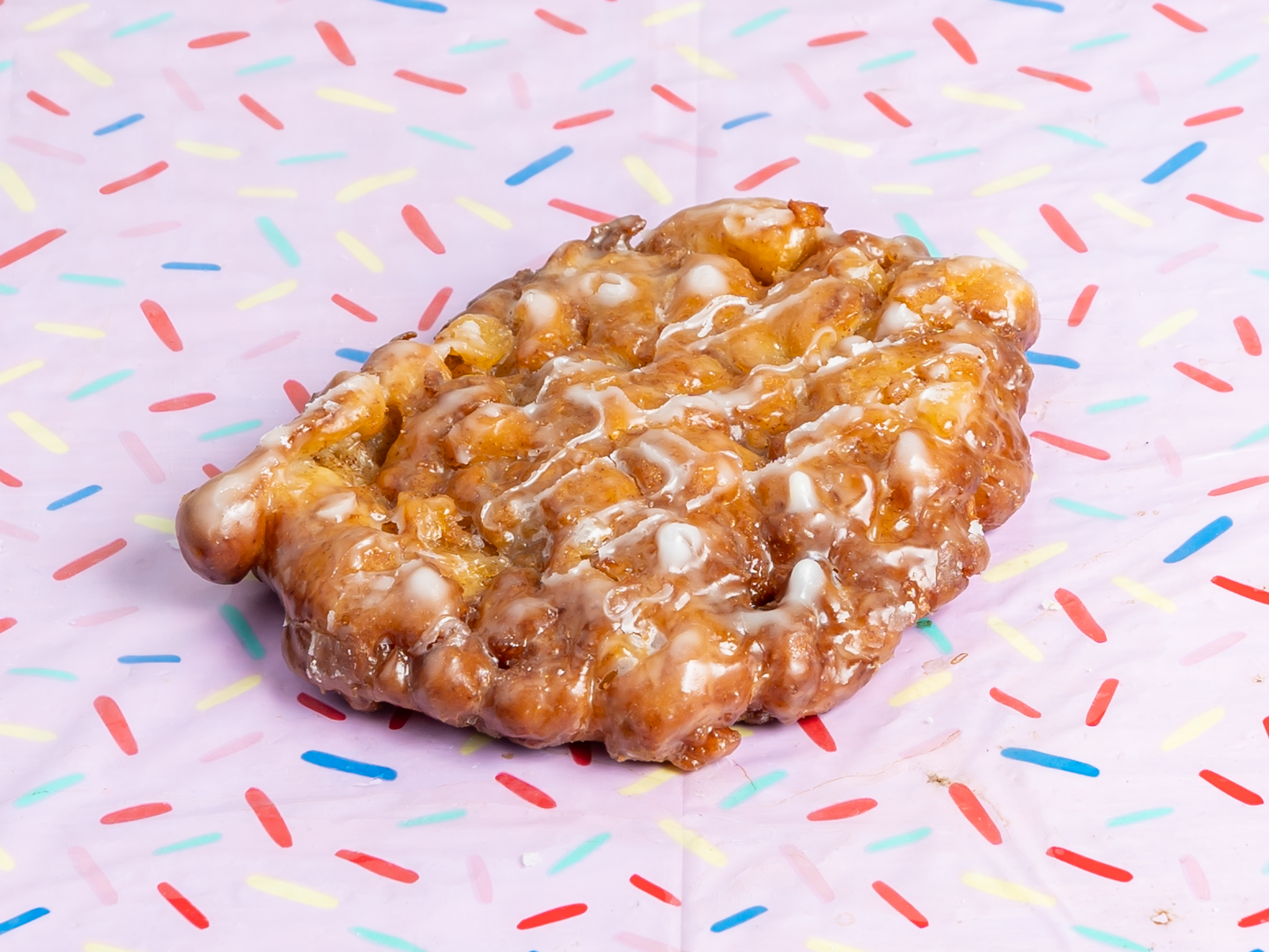 Order Apple Fritter Donut food online from Donut Queen store, Plano on bringmethat.com