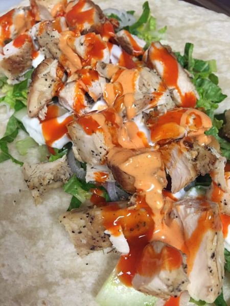Order Buffalo Wrap food online from Maria's Pizza & Wings store, Cranston on bringmethat.com
