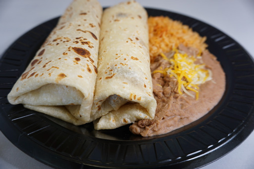 Order 15. Two Carne Asada Burritos food online from Ramiro Méxican Food store, Tucson on bringmethat.com