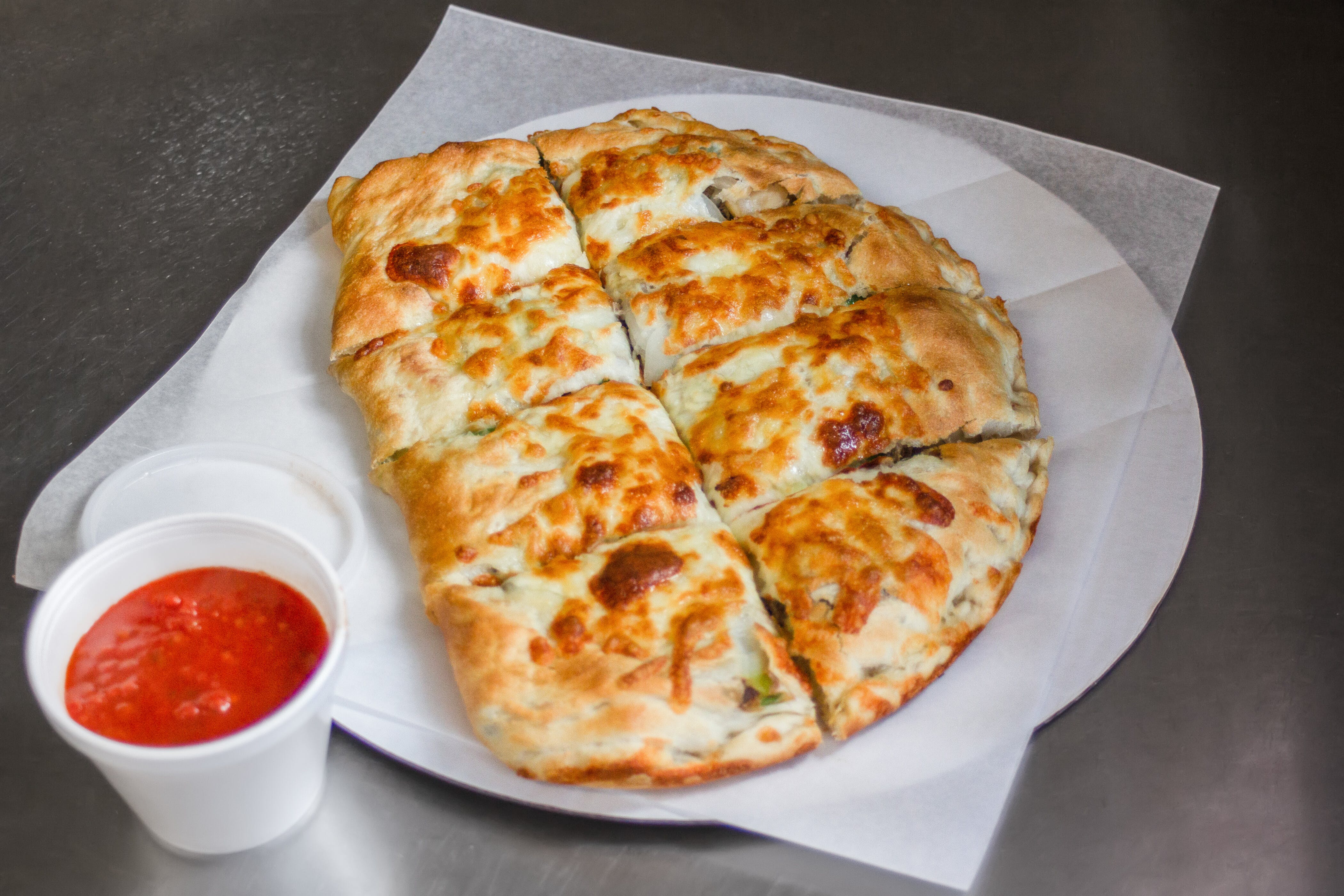 Order Buffalo Chicken Calzone - Large food online from Town House Of Pizza store, Westminster on bringmethat.com