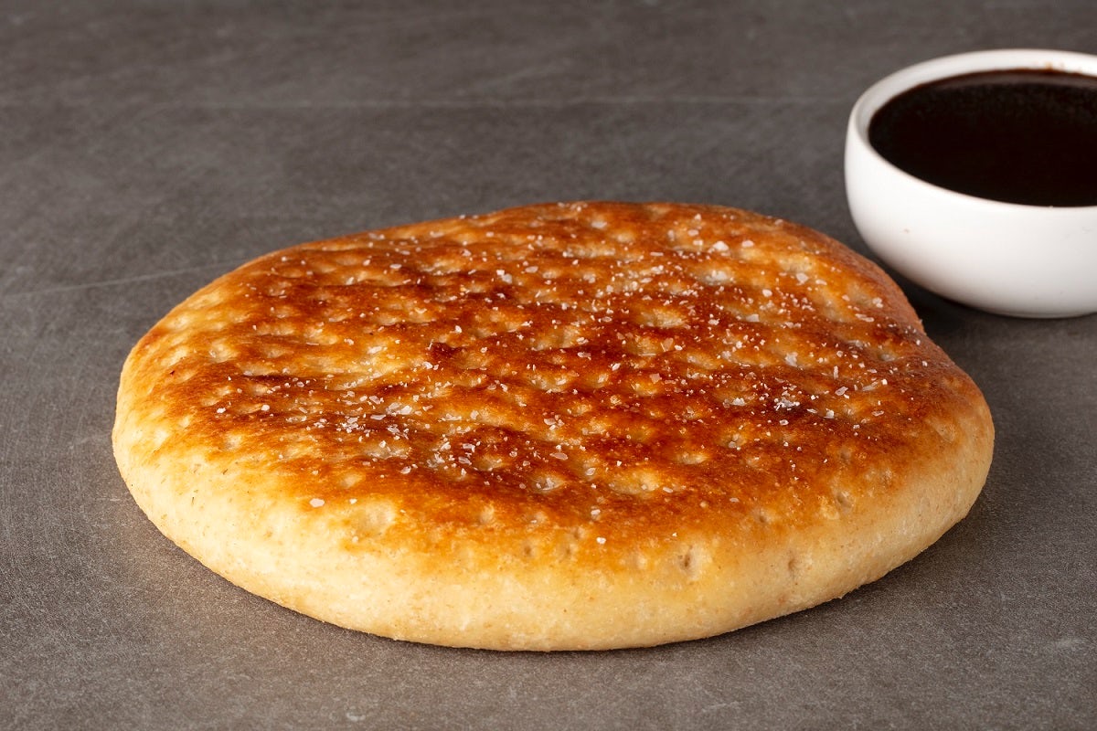 Order Fire-Baked Focaccia Bread with Dipping Sauce food online from Urbane Cafe store, Santa Maria on bringmethat.com