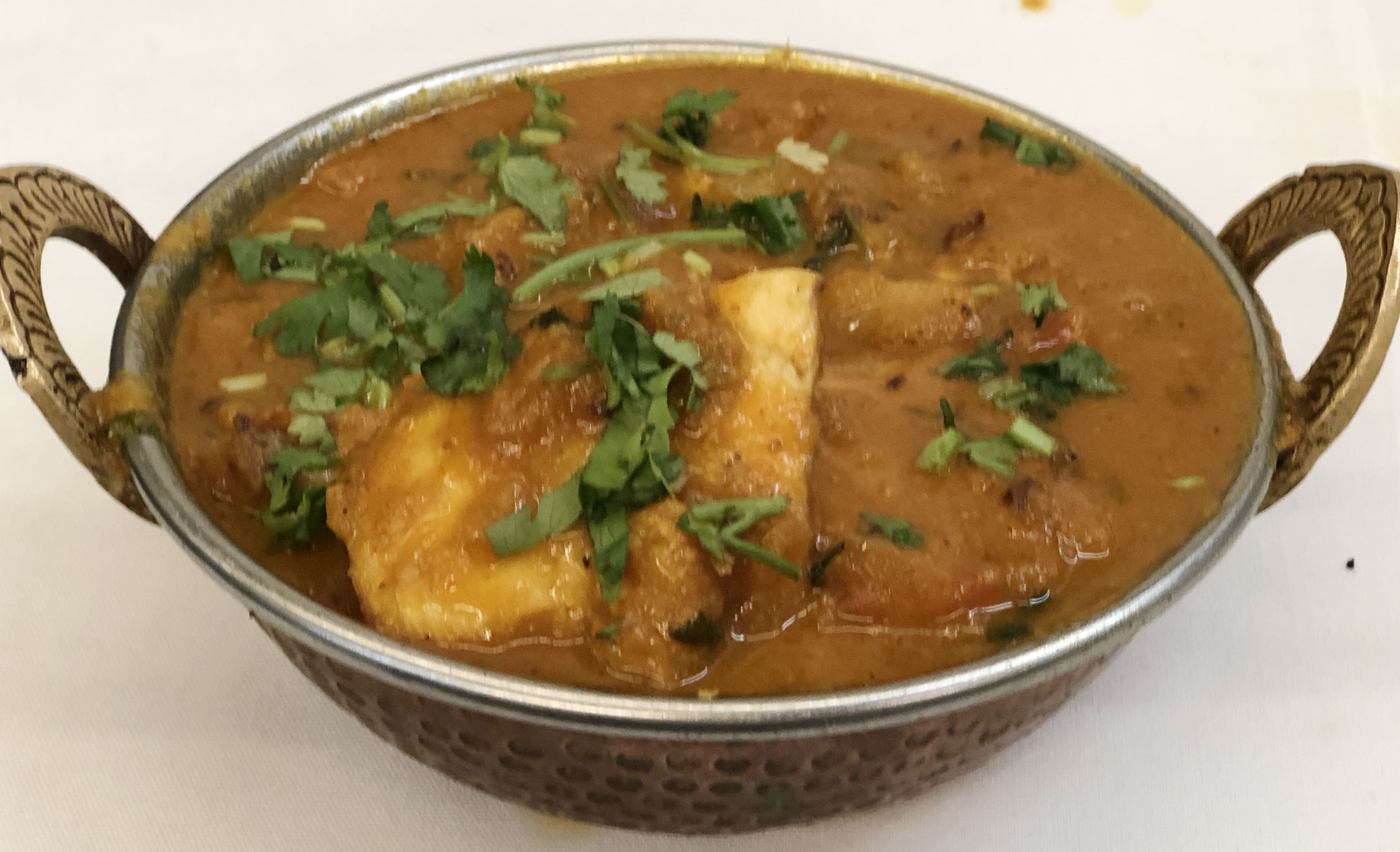 Order 6. Fish Curry food online from Himalayan Grill store, Flagstaff on bringmethat.com