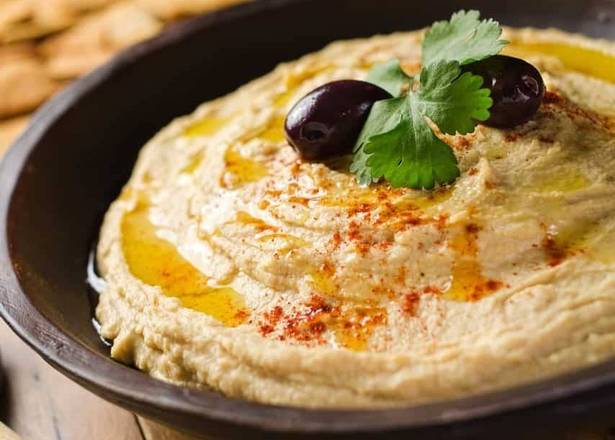 Order Hummus food online from East and Feast Lounge store, Austin on bringmethat.com