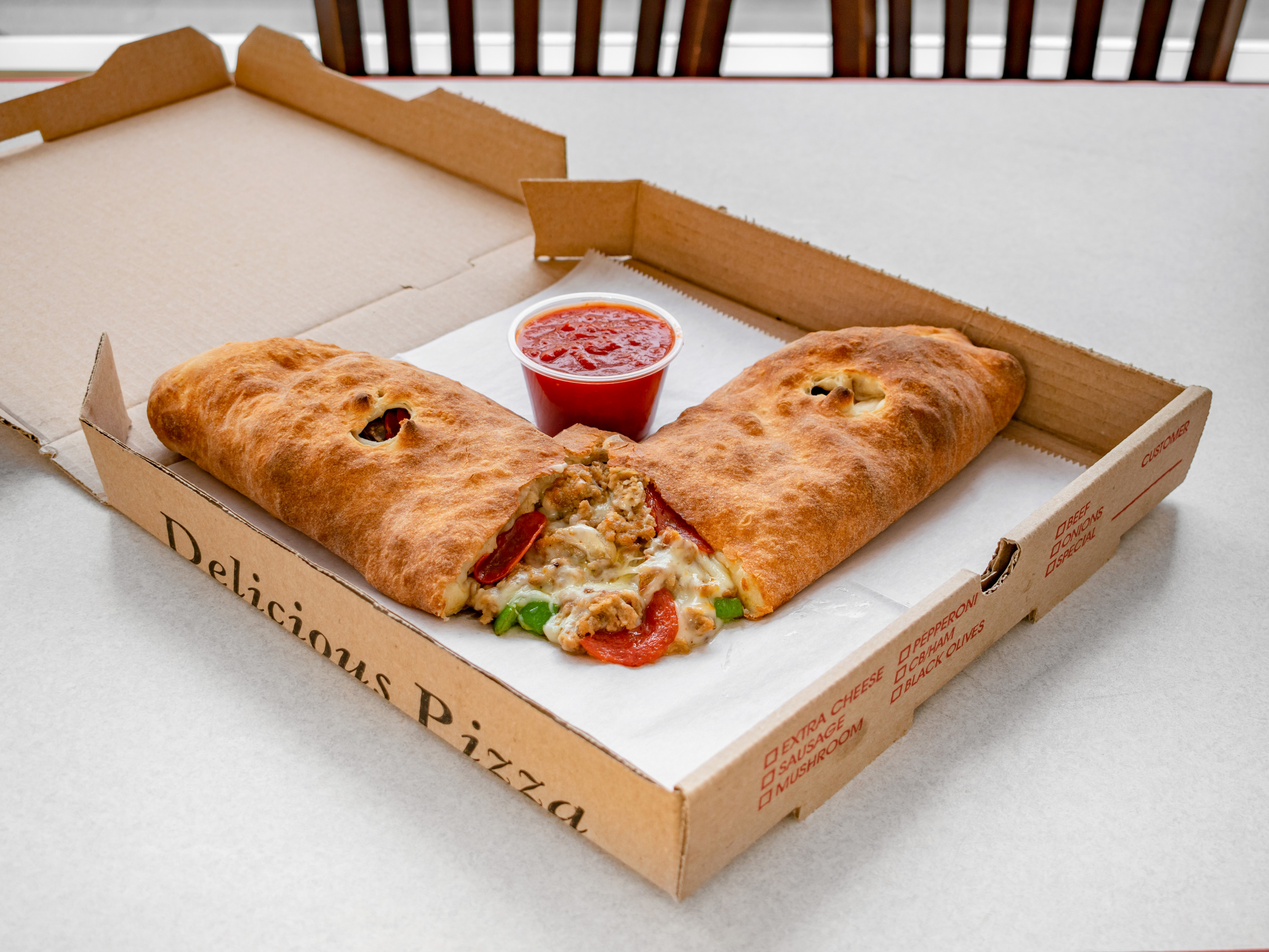 Order House Favorite Stromboli food online from Pizza & Sandwich Express store, Little Falls on bringmethat.com