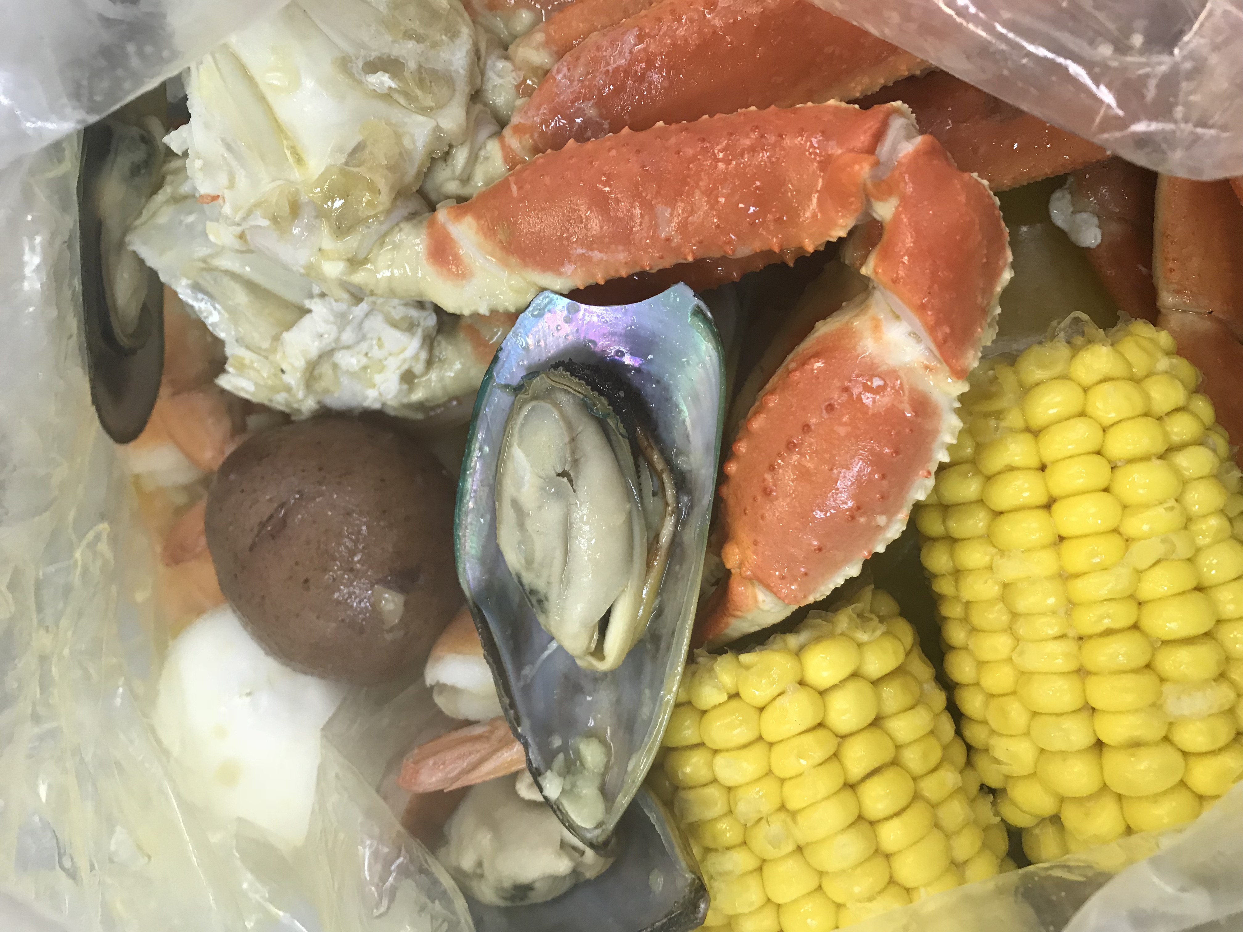 Order K. 1 lb. Snow Crab, 1/2 lb. Green Mussels and 1/2 lb. Shrimp (No Head) Combo food online from Tasty Crab store, Fayetteville on bringmethat.com